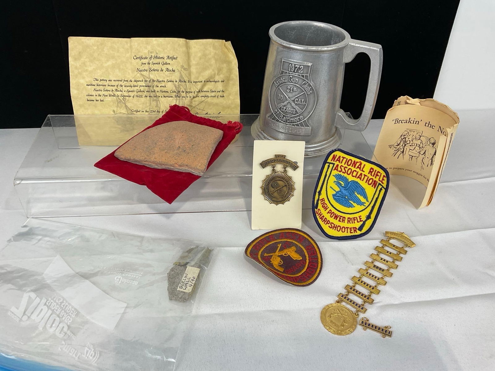 Historic Pottery Artifact Spanish from Galleon Shipwreck, Assn Club of Baltimore Stein, NRA Patches: Piece of pottery has a certificate Appears to be in good shape. The piece measures approx 7h x 7w x 6d inches. See pics. E-5180 