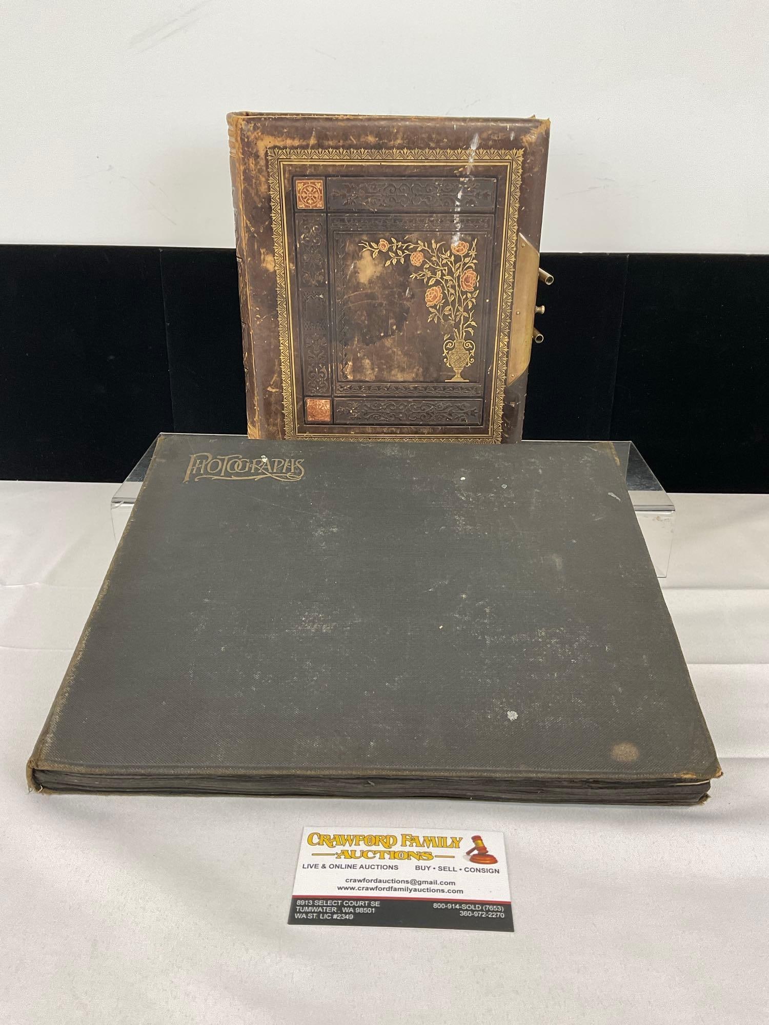 Pair of Antique Photo Albums, Portraits & 1900s Washington, Black & White: Appears to be in fair to good antique shape. The piece measures approx 5h x 13w x 11d inches. See pics. E-5400