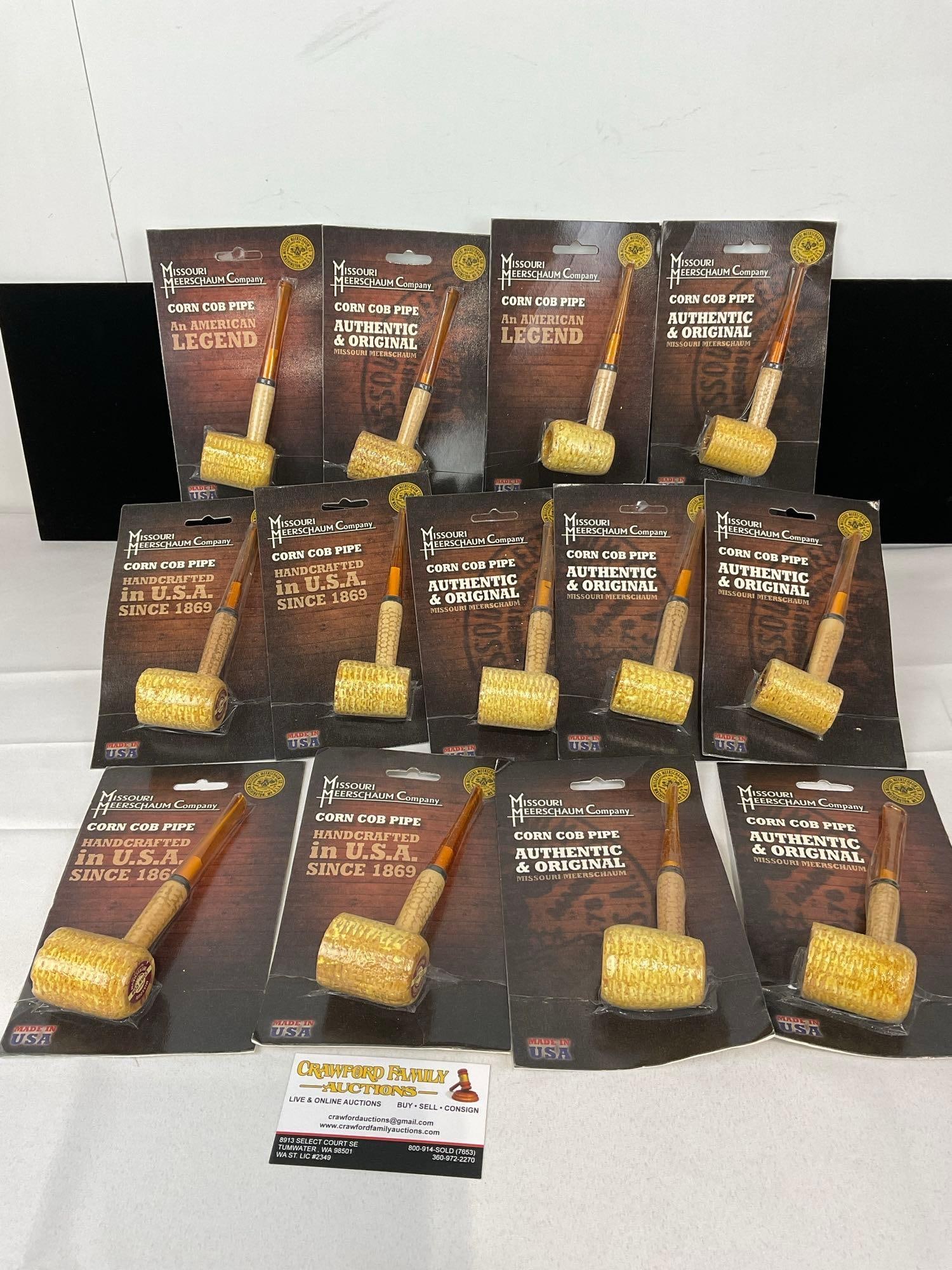 13 Missouri Meerschaum Co Corn Cob Pipes, in packaging, Straight Stems: Similar to the next few lots. Appears to be in good shape. The piece measures approx 9h x 7w x 12d inches. See pics. E-5430 