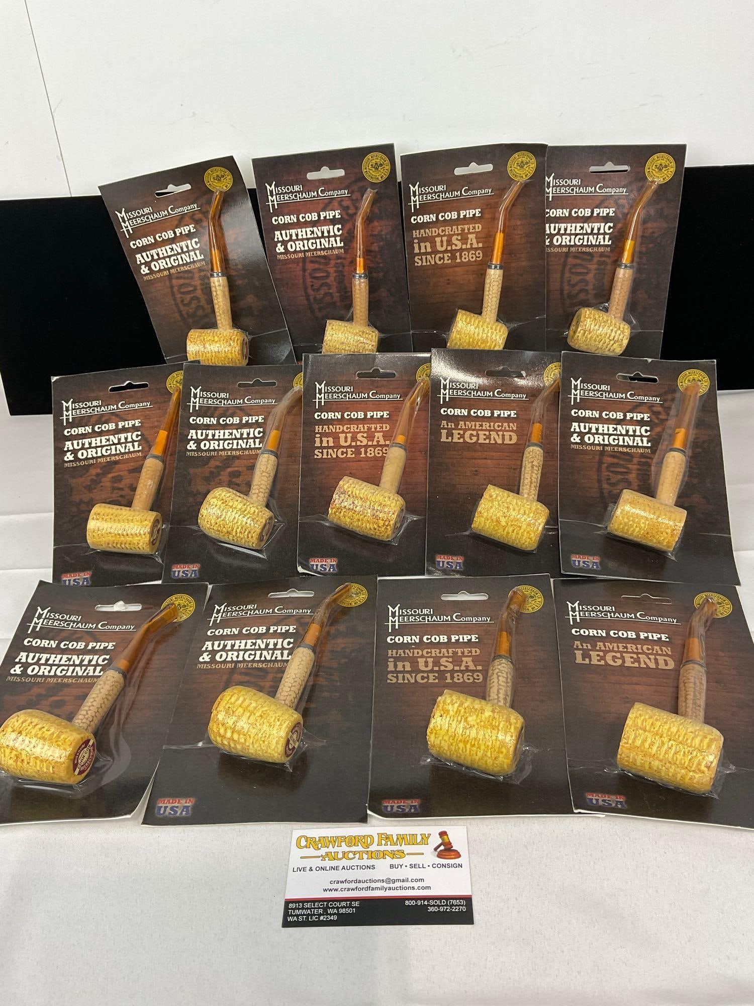 13 Missouri Meerschaum Co Corn Cob Pipes, in packaging, Bent Stems: Appears to be in good shape. The piece measures approx 10h x 12w x 4d inches. See pics. E-5430 