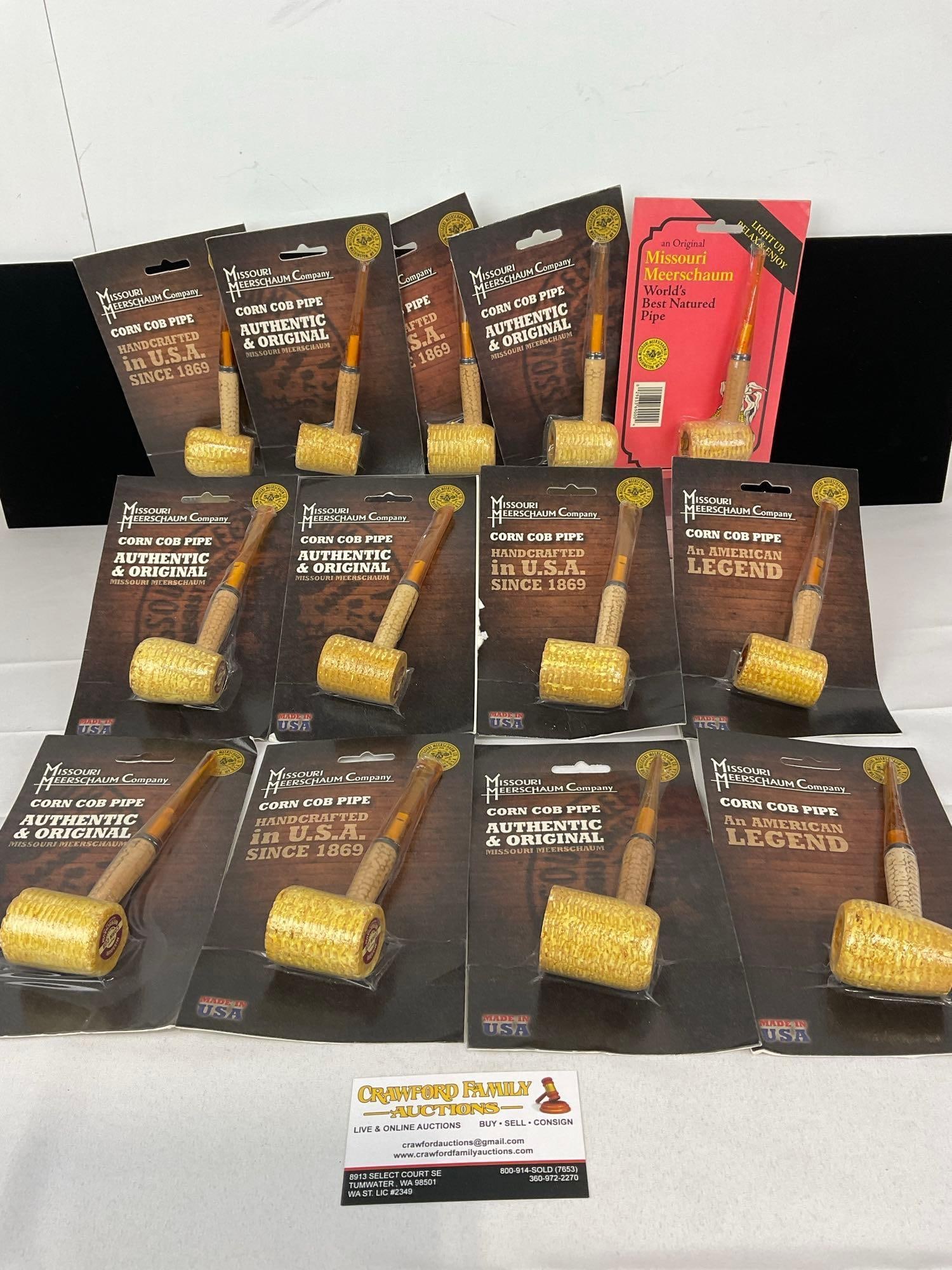 13 Missouri Meerschaum Co Corn Cob Pipes, in packaging, Straight Stems: Same as the next few lots. Appears to be in good shape. The piece measures approx 8h x 11w x 9d inches. See pics. E-5430 
