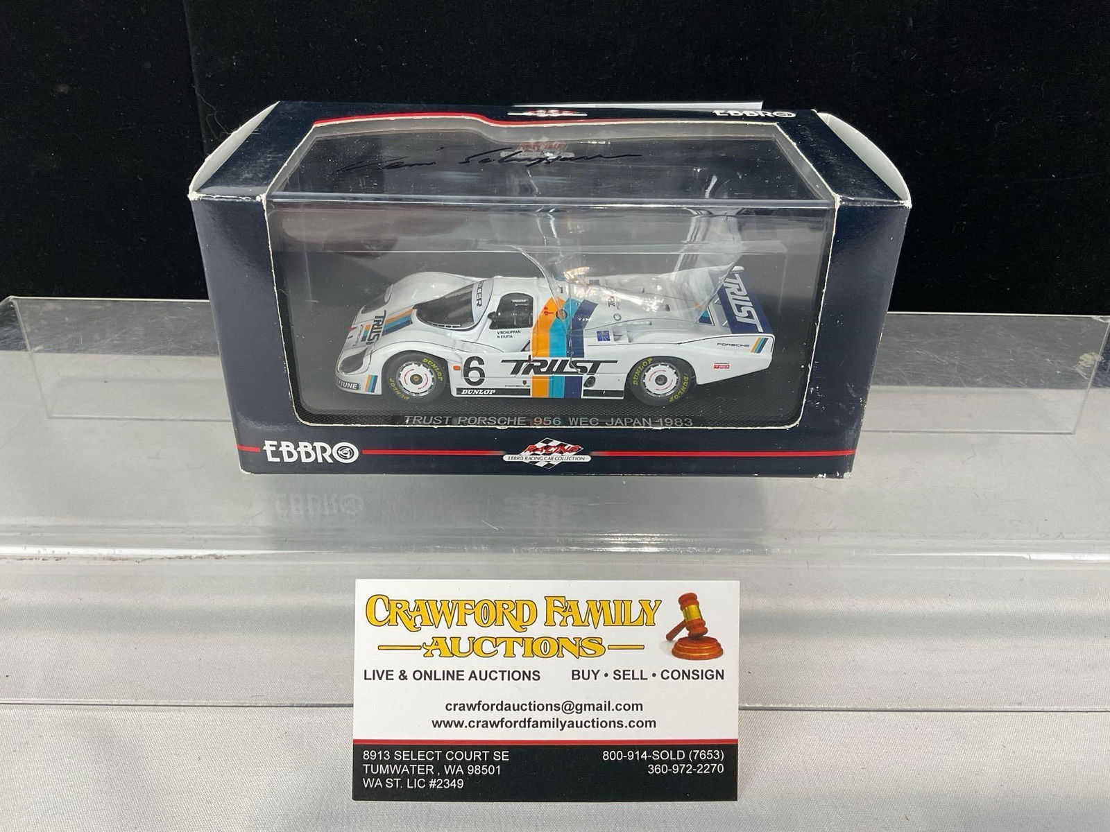 Ebbro Trust Porsche 956 WEC Japan 1983 Signed by Schuppan 1/43 Scale Diecast Car Model orig box: Some wear on the cardboard portion. The piece is signed by Vern Schuppan on the top cover. Appears to be in good shape. The piece measures approx 4h x 7w x 4d inches. See pics. E-5420
