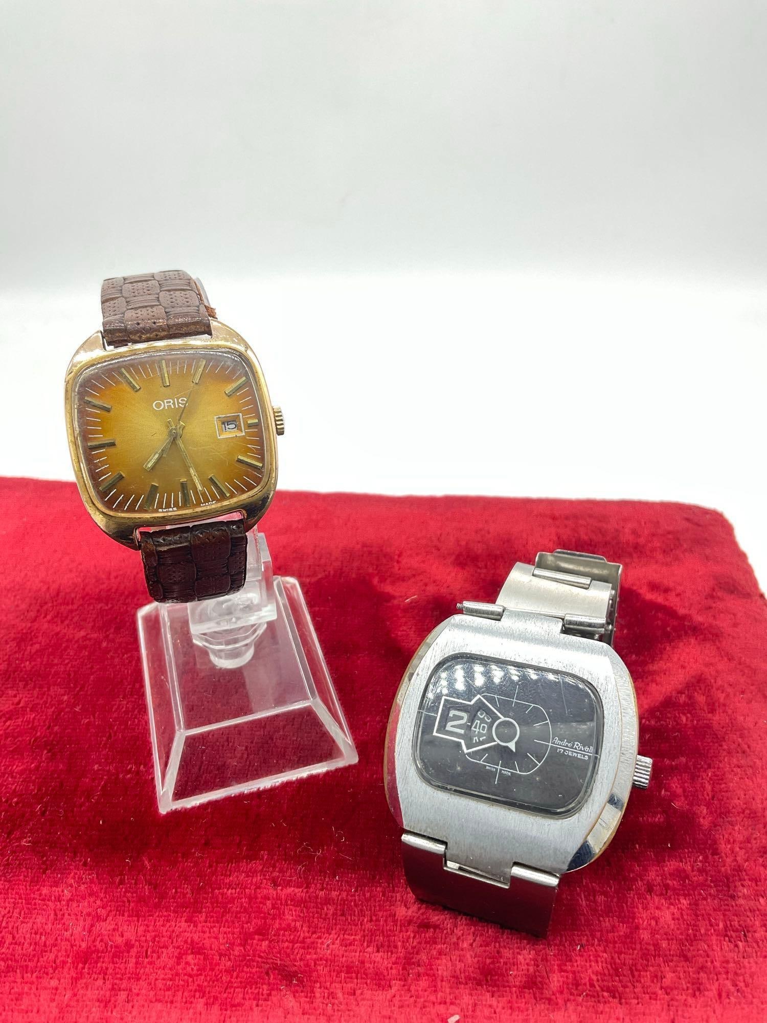 Rare Automatic Oris GP TV Style Manual Wind Date & Andre Rivalle 17 Jewels Swiss Jump Hour Watch: C-5280 Andre Rivalle Automatic 17 Jewels Swiss Manual Jump Hour Mens Watch running but not consistently Both watches are Swiss Made running but most likely need service and are in fair