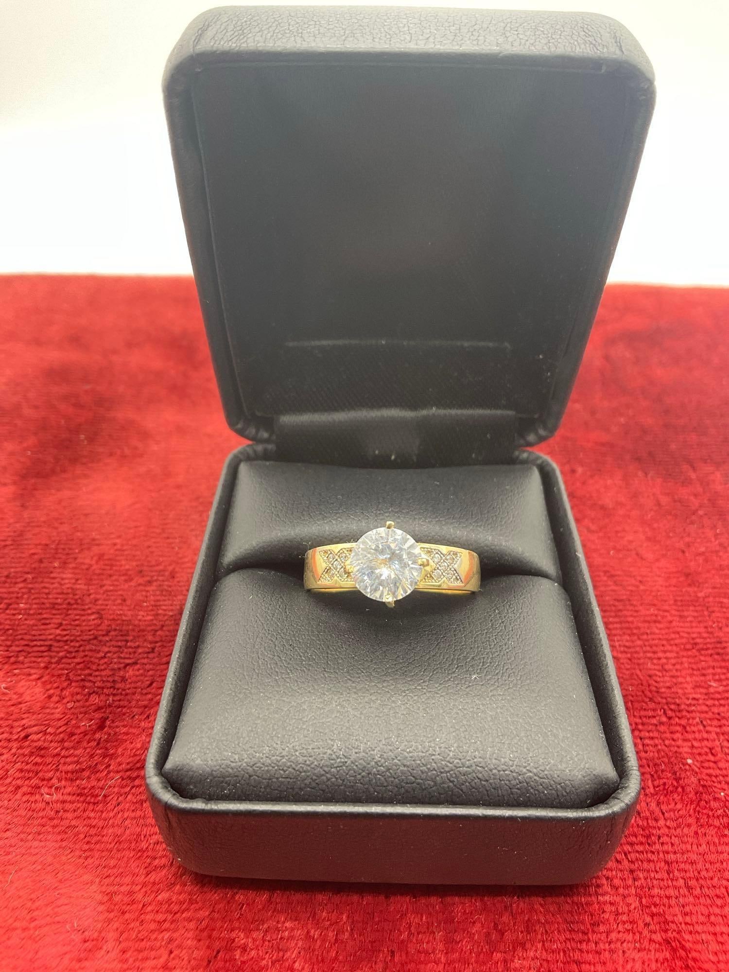 10K gold women's ring W/ 1+ Ct Zirconium center stone & fields of diamond chips on both sides (1 of 6)