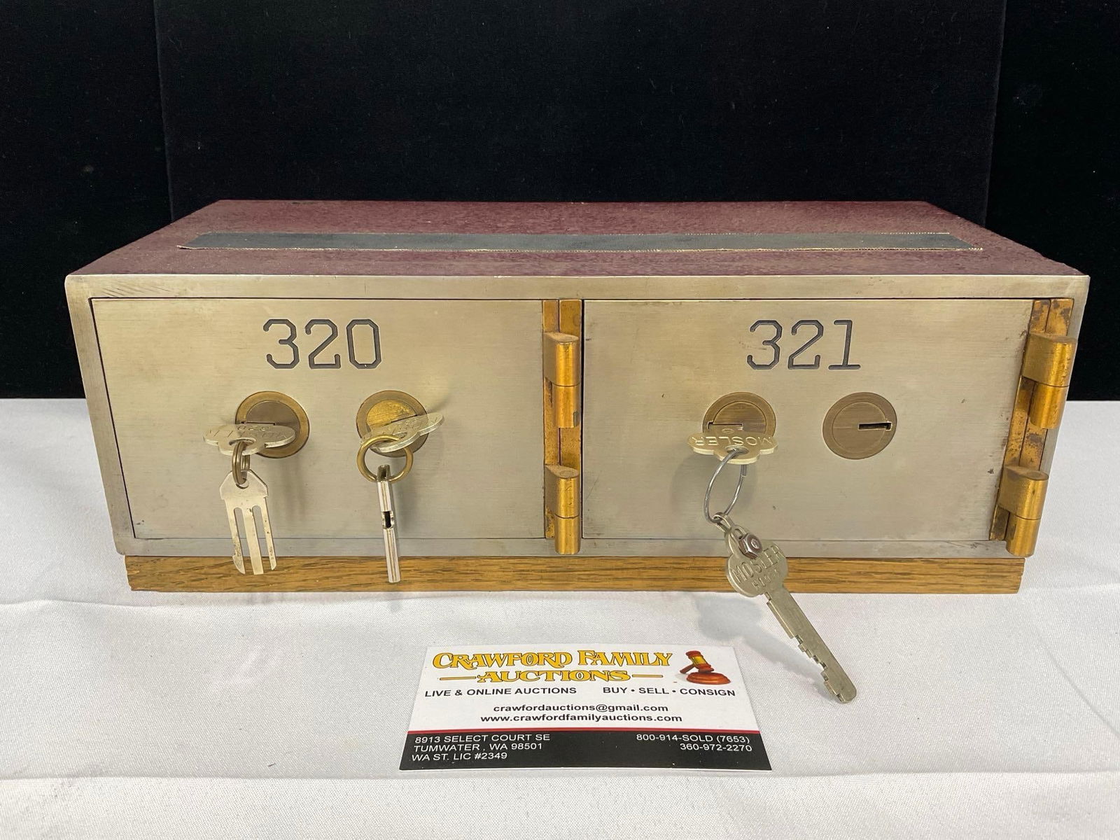 Mosler 2 Drawer Safety Deposit Box, Solid Metal, Steel & Brass, 4 keys, quite heavy, 5h x 12w x 7d: The 320 side opens well, and there is a drawer inside, was not able to open the 321 side. Appears to be in good shape. The piece measures approx 5h x 12w x 7d inches. See pics. E-5360 