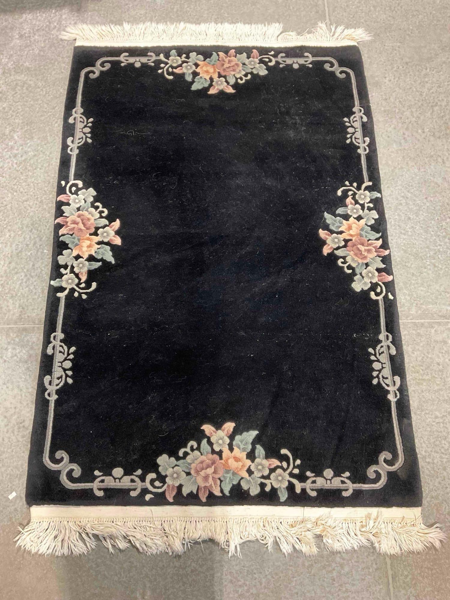 KARASTAN Kara Dynasty Ebony Black Floral Pattern Wool Pile Rug. Excellent Condition. See pics.: KARASTAN Kara Dynasty Ebony Black Floral Pattern Wool Pile Rug. Excellent Condition. Match to lot 162. Measures 76" x 45" DM-5520