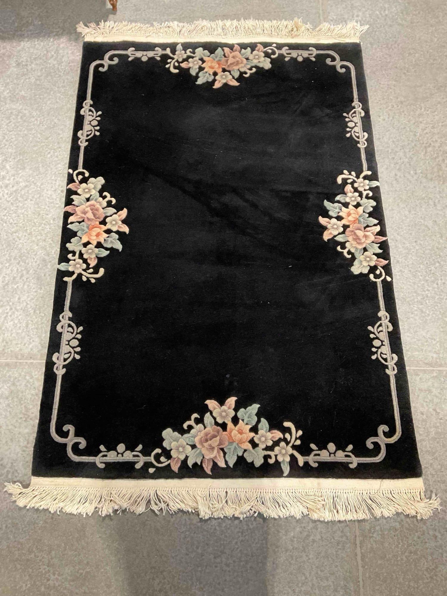 KARASTAN Kara Dynasty Ebony Black Floral Pattern Wool Pile Rug. Excellent Condition. See pics.: KARASTAN Kara Dynasty Ebony Black Floral Pattern Wool Pile Rug. Excellent Condition. Match to lot 161. Measures 76" x 45" DM-5520