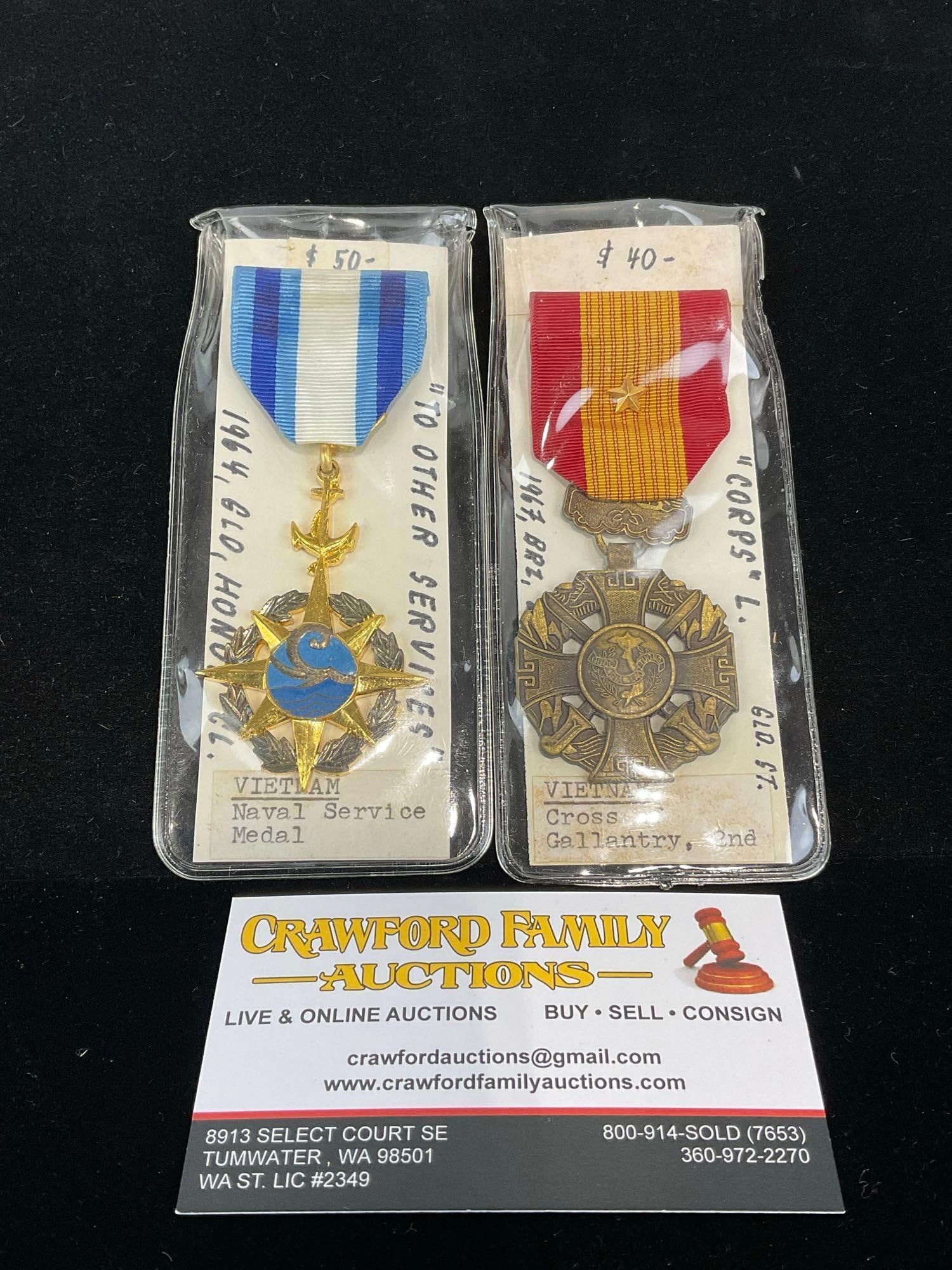 Pair of Vietnamese Medals, Naval Service 1964 & Cross Gallantry 2nd Class, 1967: All from a single collection, these are briefly described on the tag and were kept in a display. They measure approx 6h x 3w x 2d inches. See pics. E-5300 