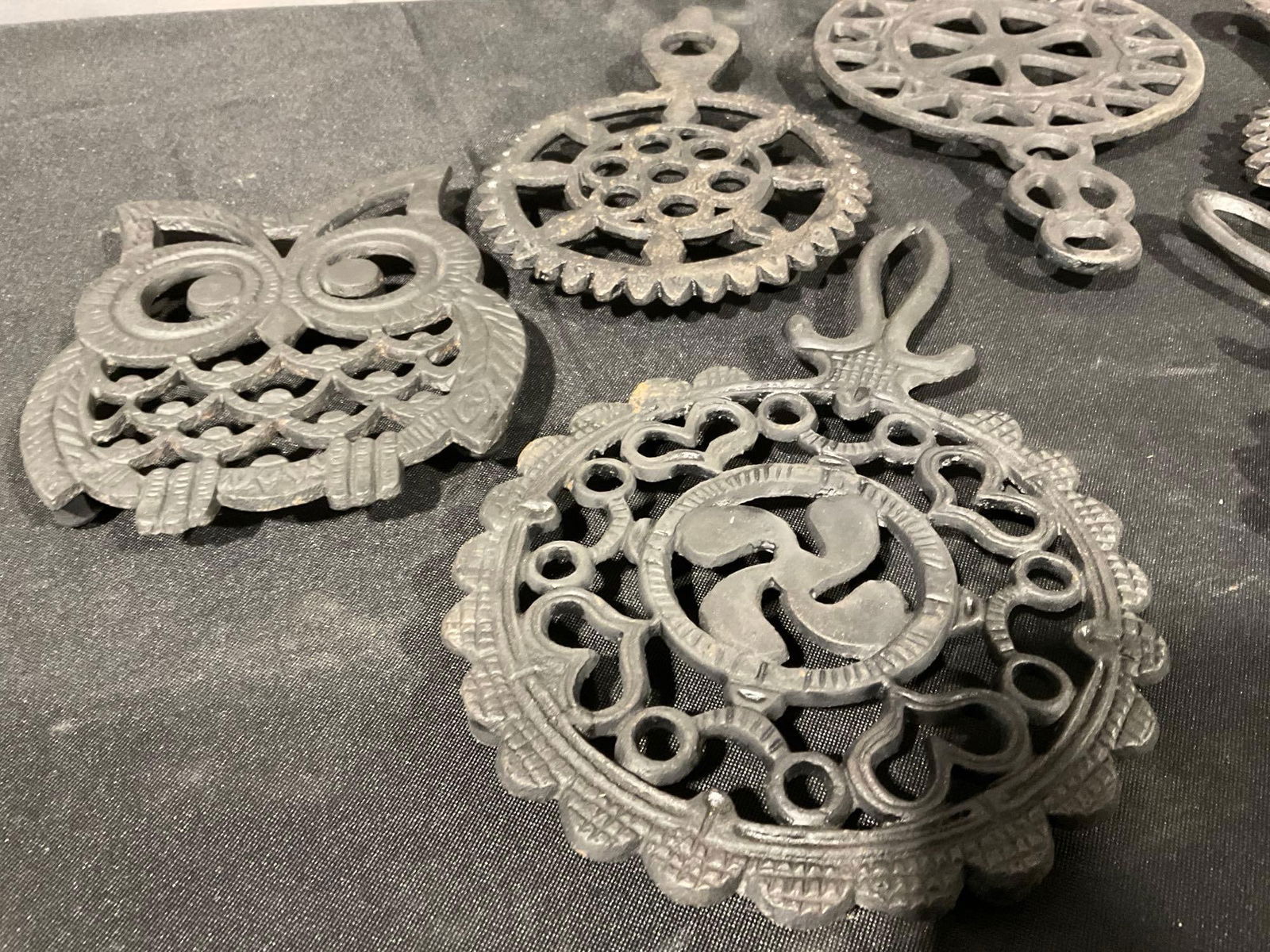 7 Cast Iron Trivets, Unique Designs, Owl shaped, and round scalloped edges, 5h x 11w x 8d inches - 2
