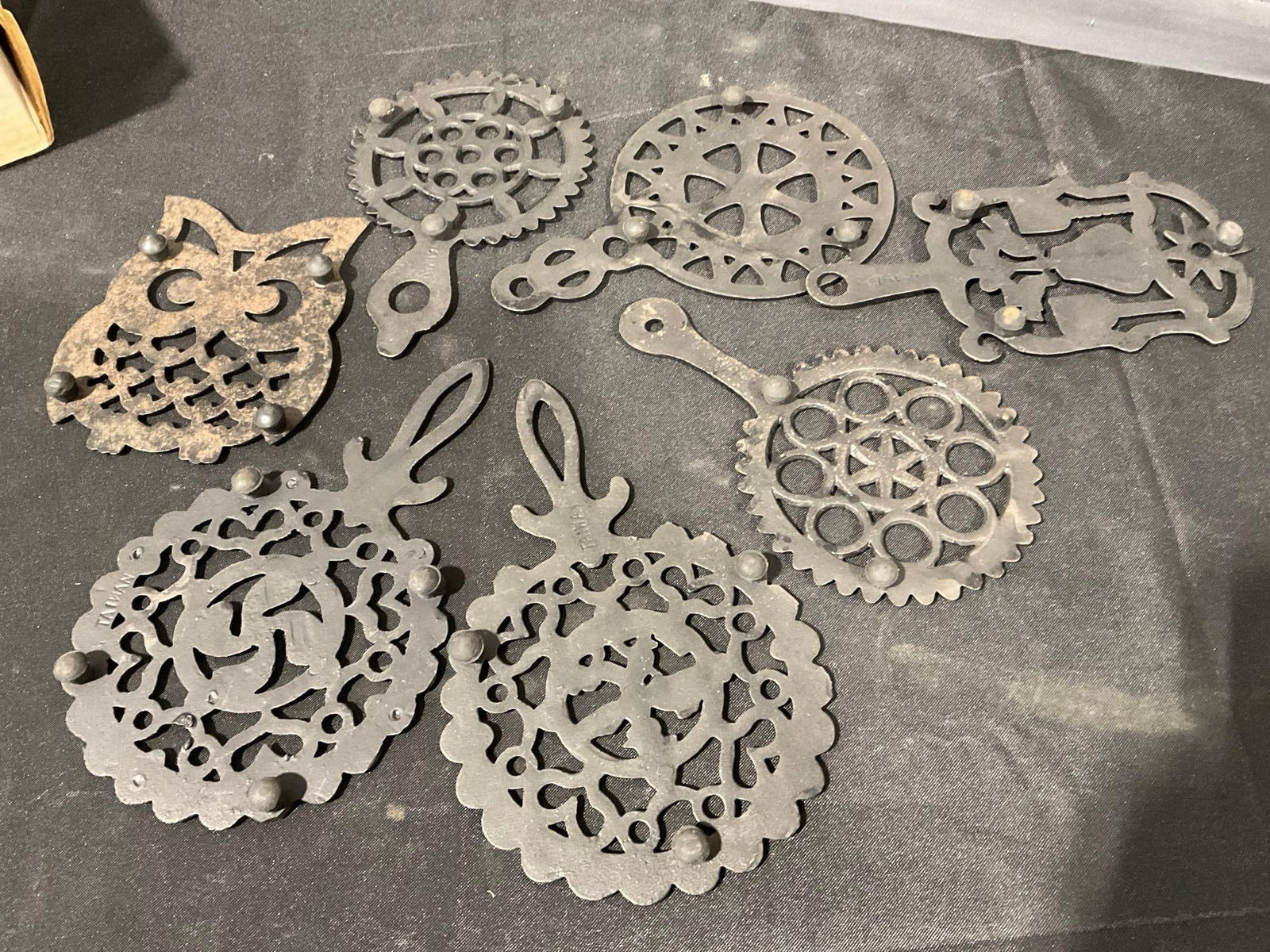 7 Cast Iron Trivets, Unique Designs, Owl shaped, and round scalloped edges, 5h x 11w x 8d inches - 4