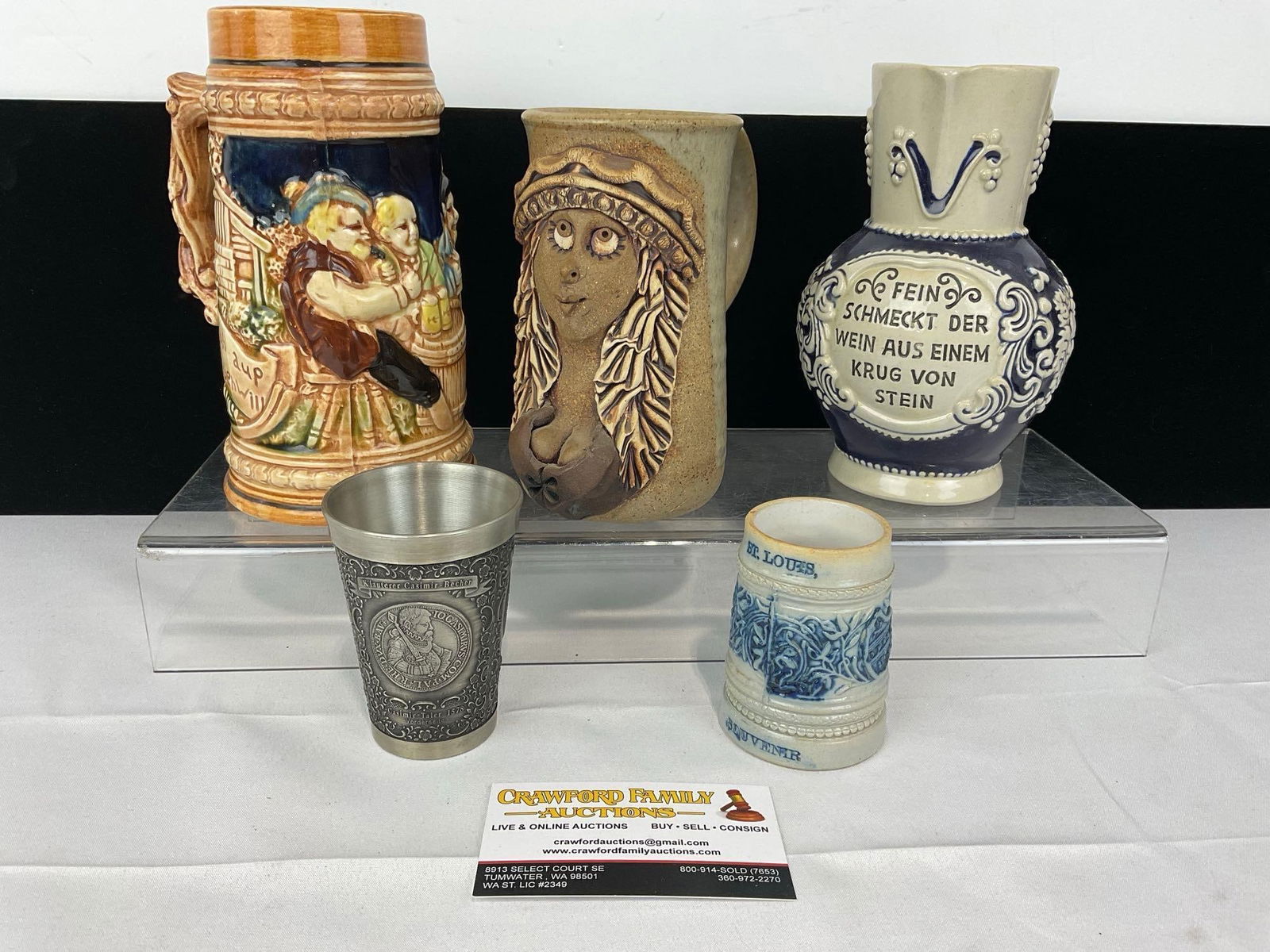 5 Unique Cups, 3 Salt Glazed Steins, Pewter Cup & Unique Maiden High Relief Jim Rumph Mug: Appears to be in good shape. The pieces together measures approx 10h x 10w x 9d inches. See pics. E-5360 