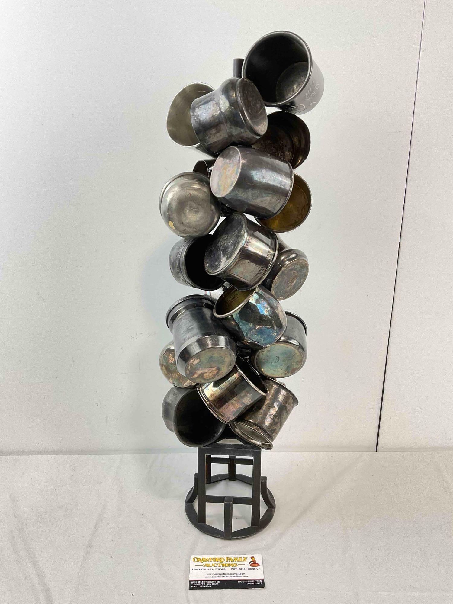 21 pcs Vintage Silver Plated & Pewter Christening Cup Assortment. Very Good Condition. See pics.: 21 pcs Vintage Silver Plated & Pewter Christening Cup Assortment. Very Good Condition. Charmingly arranged on metal stand. Includes Gorham, Hamilton and New Amsterdam makers. Measures 5" x 6" x 23