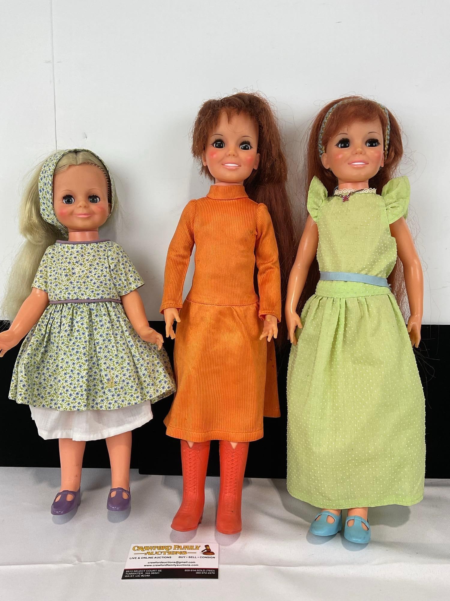 Set of 3 Ideal Dolls, 1969 & 1971 Crissy Dolls w/growing hair, 18 inches tall & 1970 Velvet Doll: Appears to be in good shape. The piece measures approx 8h x 18w x 9d inches. See pics. E-5430 