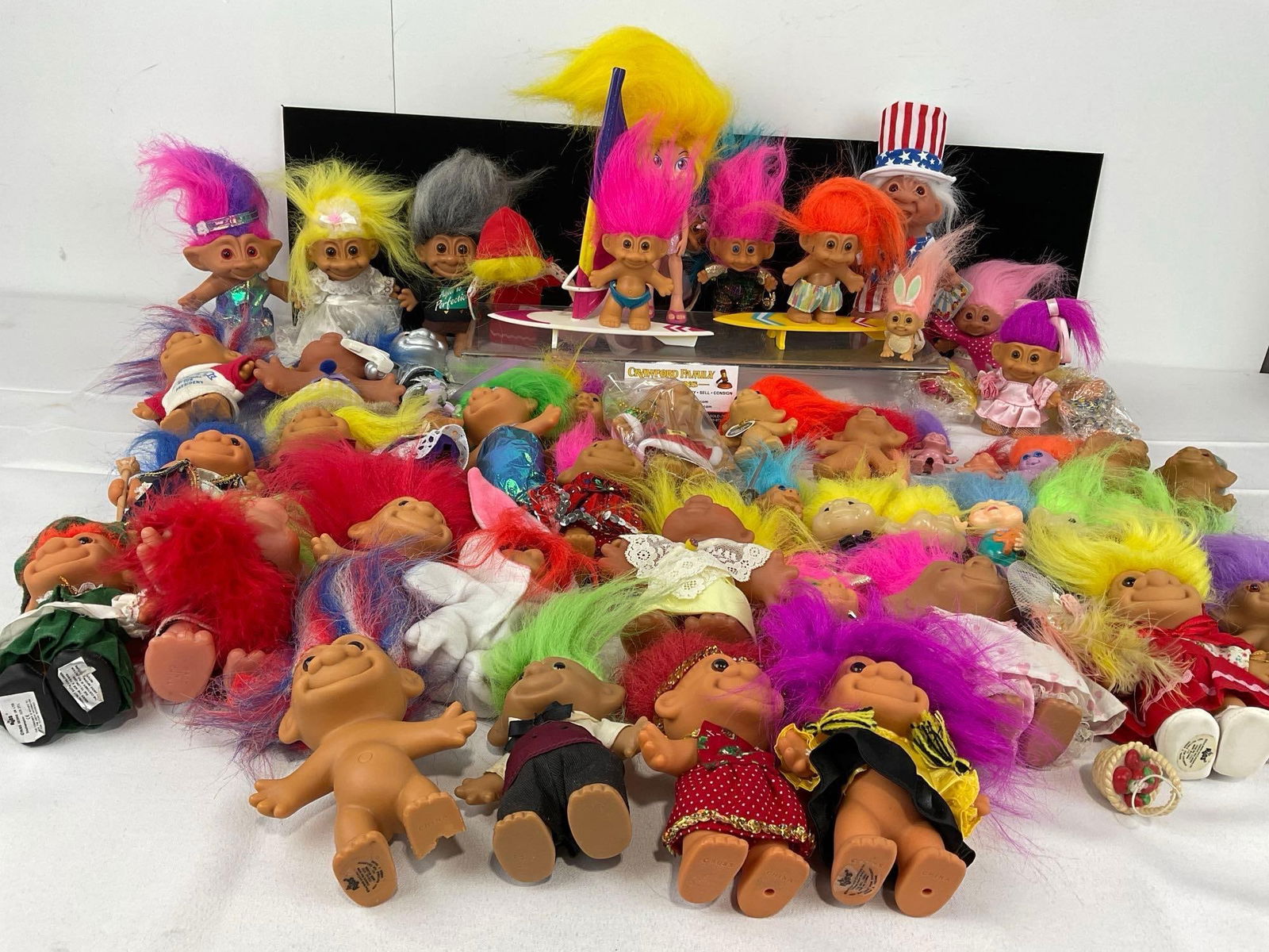 40+ Vintage Troll Dolls Variety of Styles, mostly by Russ, Multicolor hair: Appears to be in good shape. The piece measures approx 10h x 18w x 12d inches. See pics. E-5430 