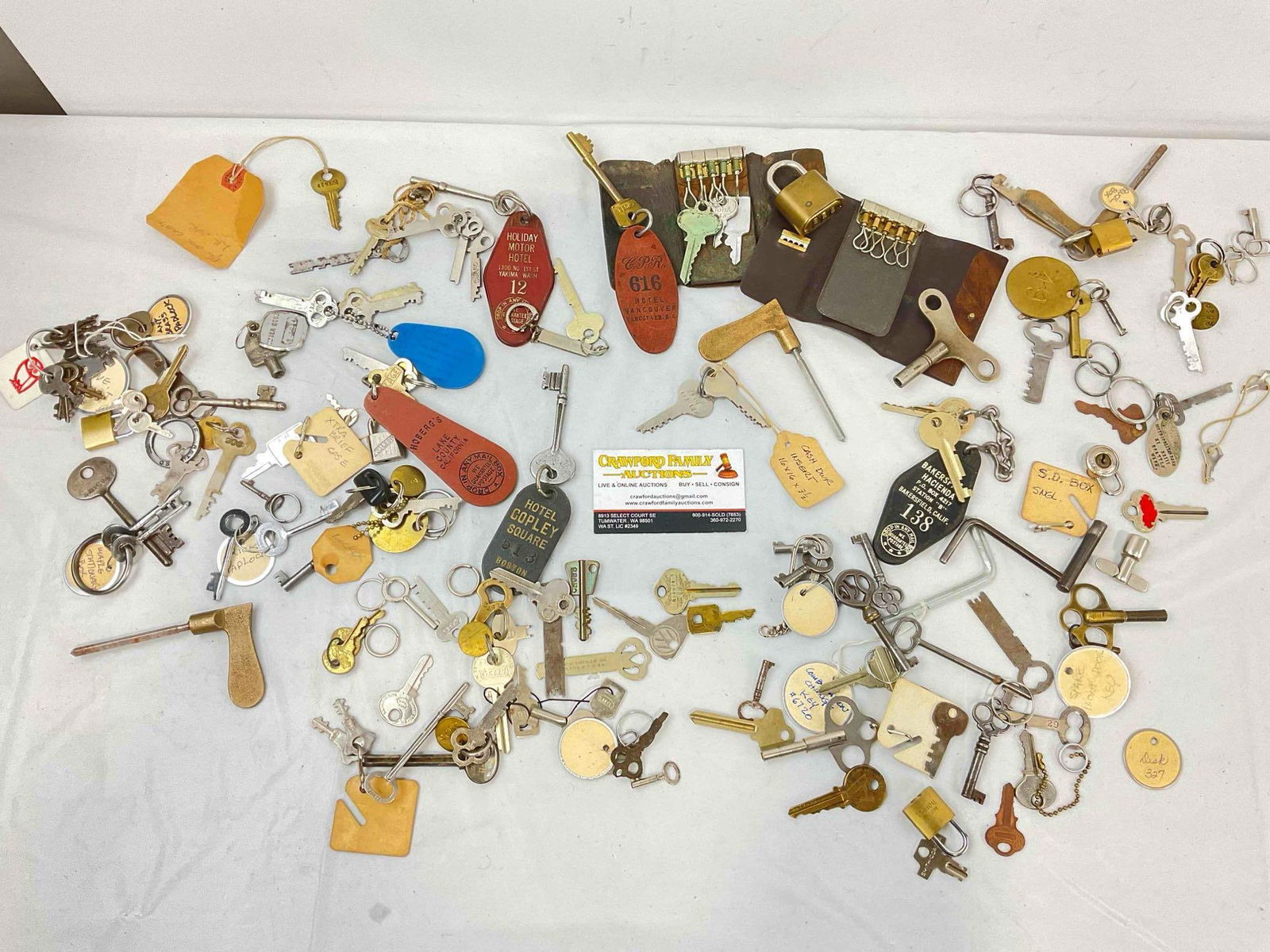 50+ pcs Vintage Key Collection, incl. Hotel & Motel Keys, Drop Box Keys, Winding Keys & More!: 50+ pcs Vintage Key Collection, incl. Hotel & Motel Keys, Drop Box Keys, Winding Keys & More! minor wear indicative of age, condition is otherwise very good. Fits in box measuring 6" x 12" x 6