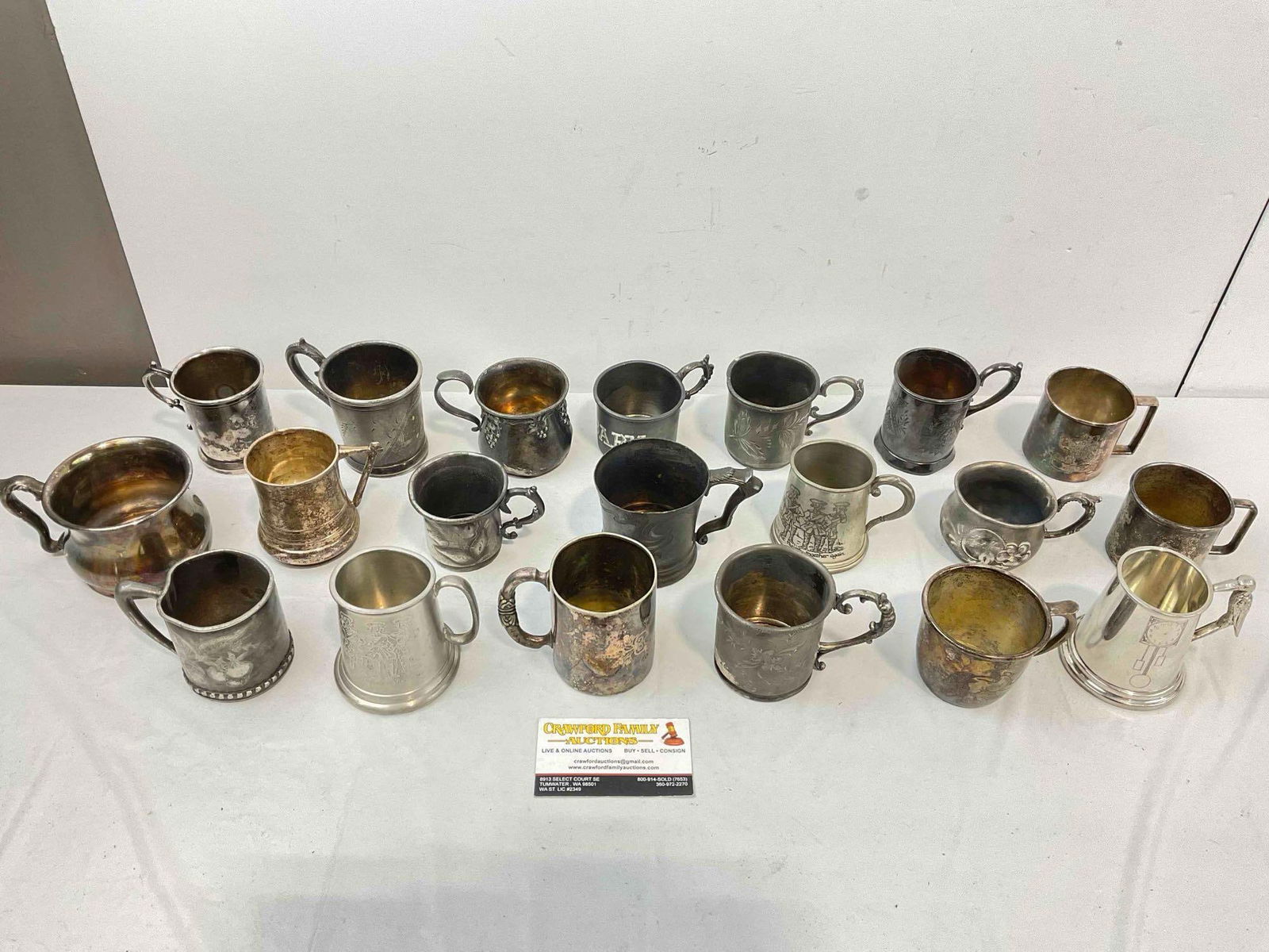 20 pcs Vintage Silver Plated & Pewter Baby Christening Mugs, incl. Sheffield & Victor Silver.: 20 pcs Vintage Silver Plated & Pewter Baby Christening Mugs, incl. Sheffield & Victor Silver. Minor wear indicative of age, patinated, condition is otherwise very good. Largest measures