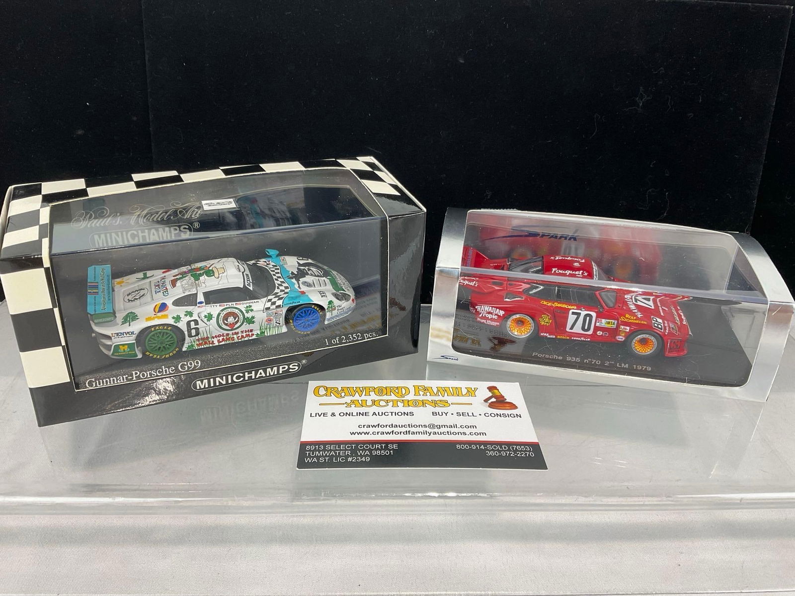 2 1/43 Scale Porsche Diecast Car Models, 1979 935 LM 24H & 2003 G-99 Bully Hill Vineyards 250 Grand: The cars were driven by Paul Newman, Dick Barbour, Rolf Stommelon, Kyle Petty & Gunnar Jeannette. Appears to be in good shape. The piece measures approx 7h x 7w x 4d inches. See pics. E-5420 