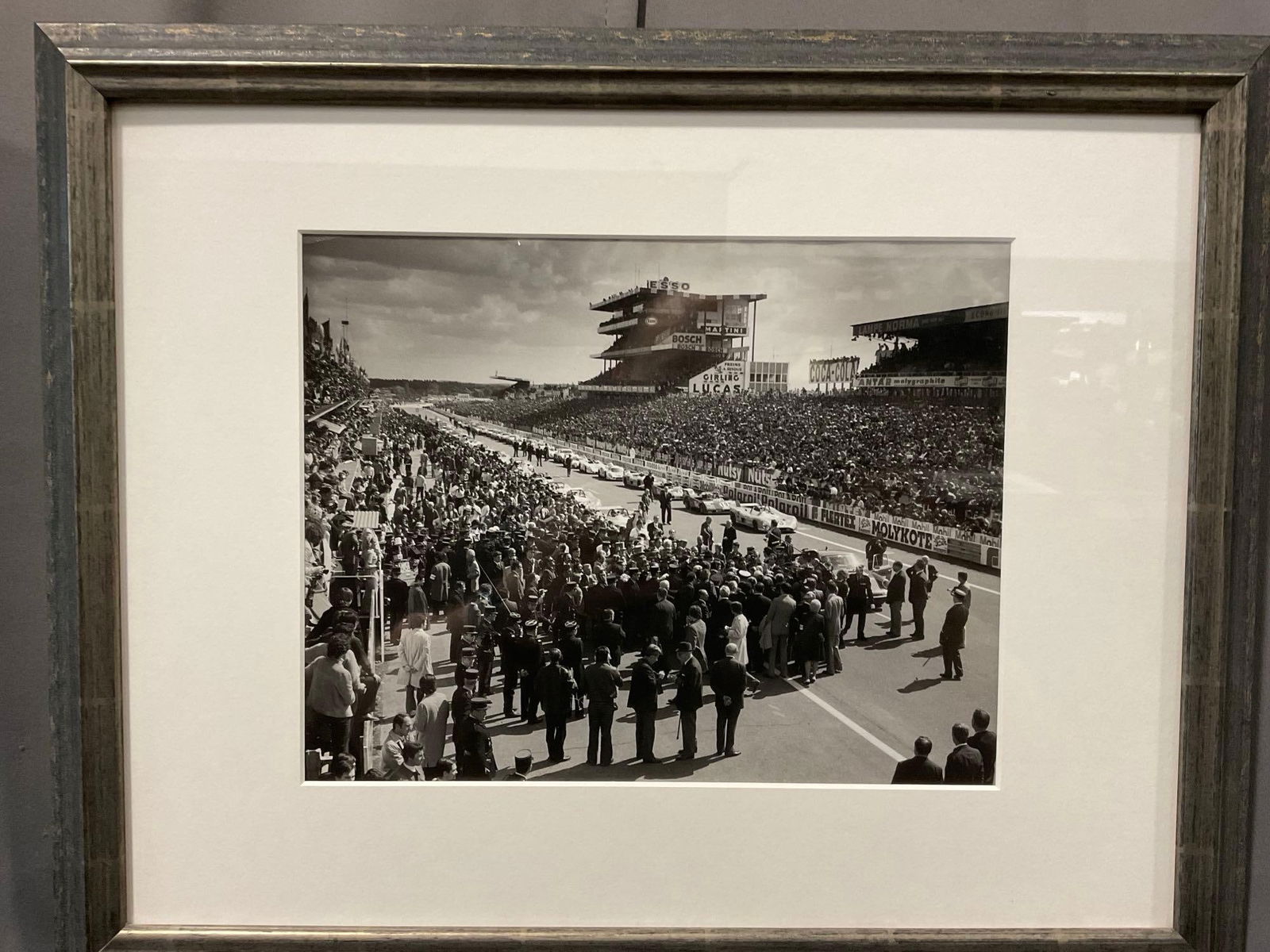 Framed Vintage Racing Photo, Le Mans Pre-Start 1972, 17h x 21w inches: Appears to be in good shape. The piece measures approx 17h x 21w x 3d inches. See pics. E-5420