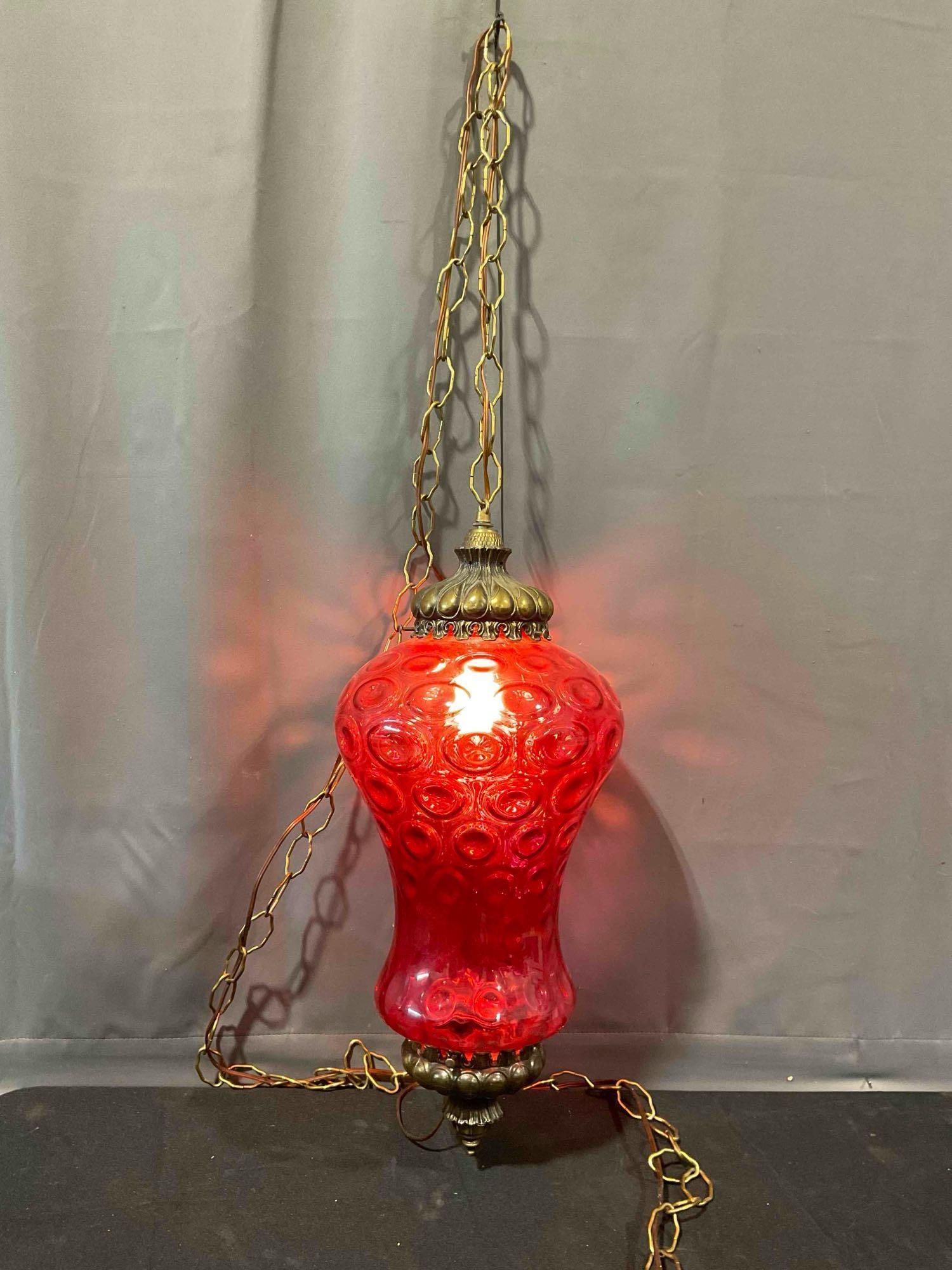 Vintage MCM Hanging Swag Lamp w/ Textured Cranberry Red Glass Shade. Tested, Works.: Vintage MCM Hanging Swag Lamp w/ Textured Cranberry Red Glass Shade. Tested, Works, cord is wrapped in electrical tape and might need repair. Matches lot #74. Minor wear indicative of age, condition i