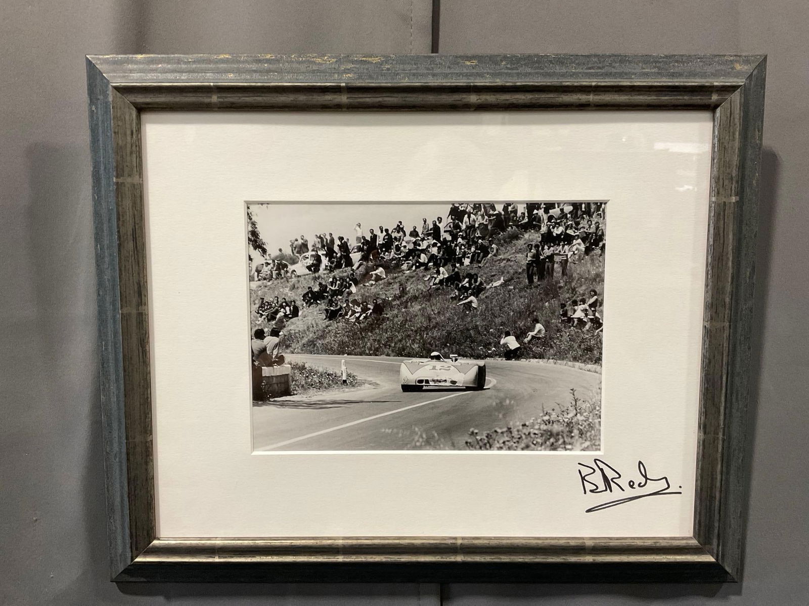 Framed Vintage Racing Photo Jo Siffert & Signed Brian Redman, Porsche 908 Targa Florio 1970: Photo by Eric della Faille. Appears to be in good shape. The piece measures approx 14h x 17w x 3d inches. See pics. E-5420 