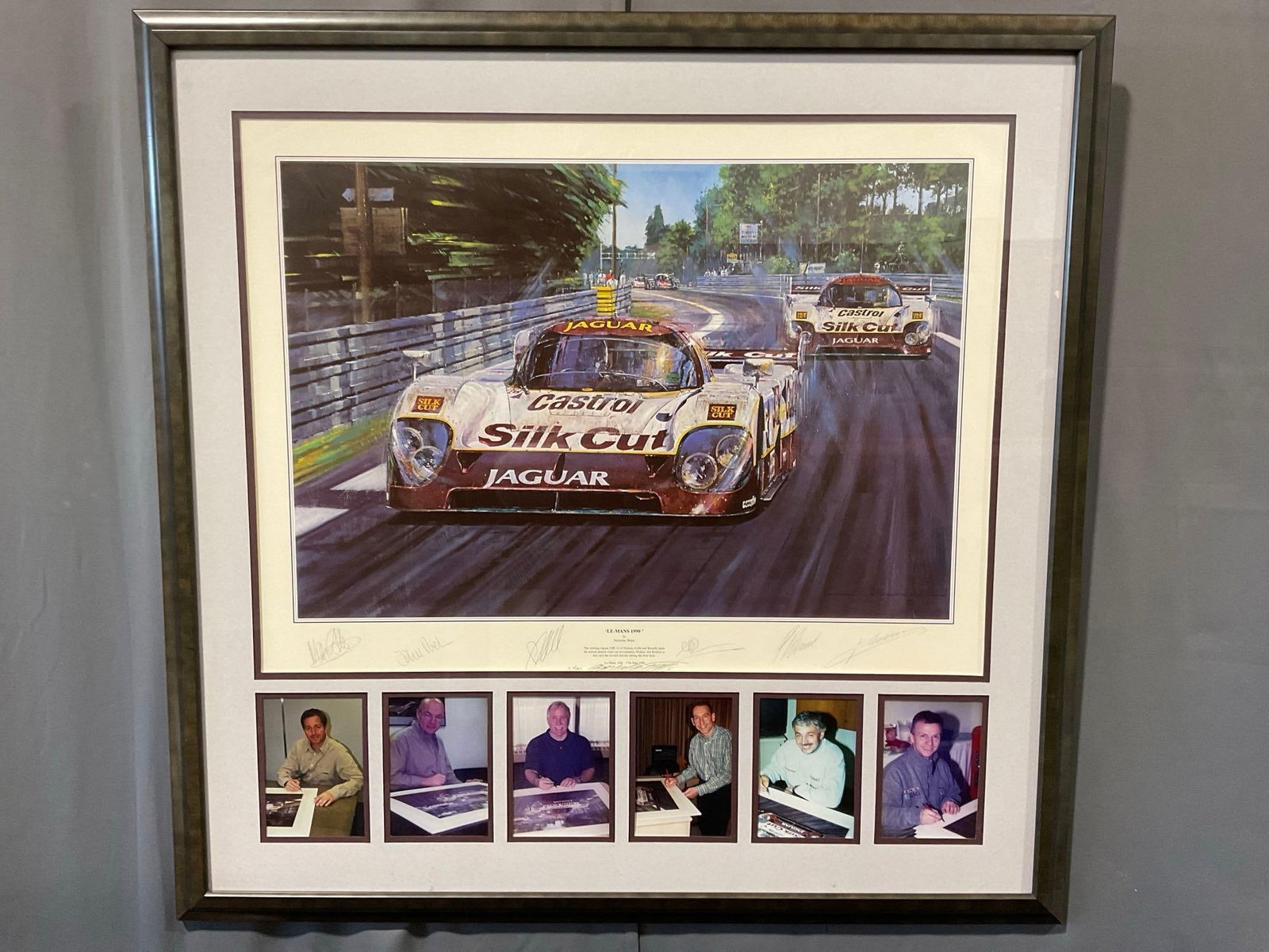 Framed #d 17/500 Le Mans 1990 by Nicholas Watts, 36h x 37w x 3d inches, signed by 6 drivers & art...: Signed by John Neilsen, Price Cobb, Martin Brundle, Jan Lammers, Andy Wallace & Franz Konrad. Appears to be in good shape. The piece measures approx 36h x 37w x 3d inches. See pics.