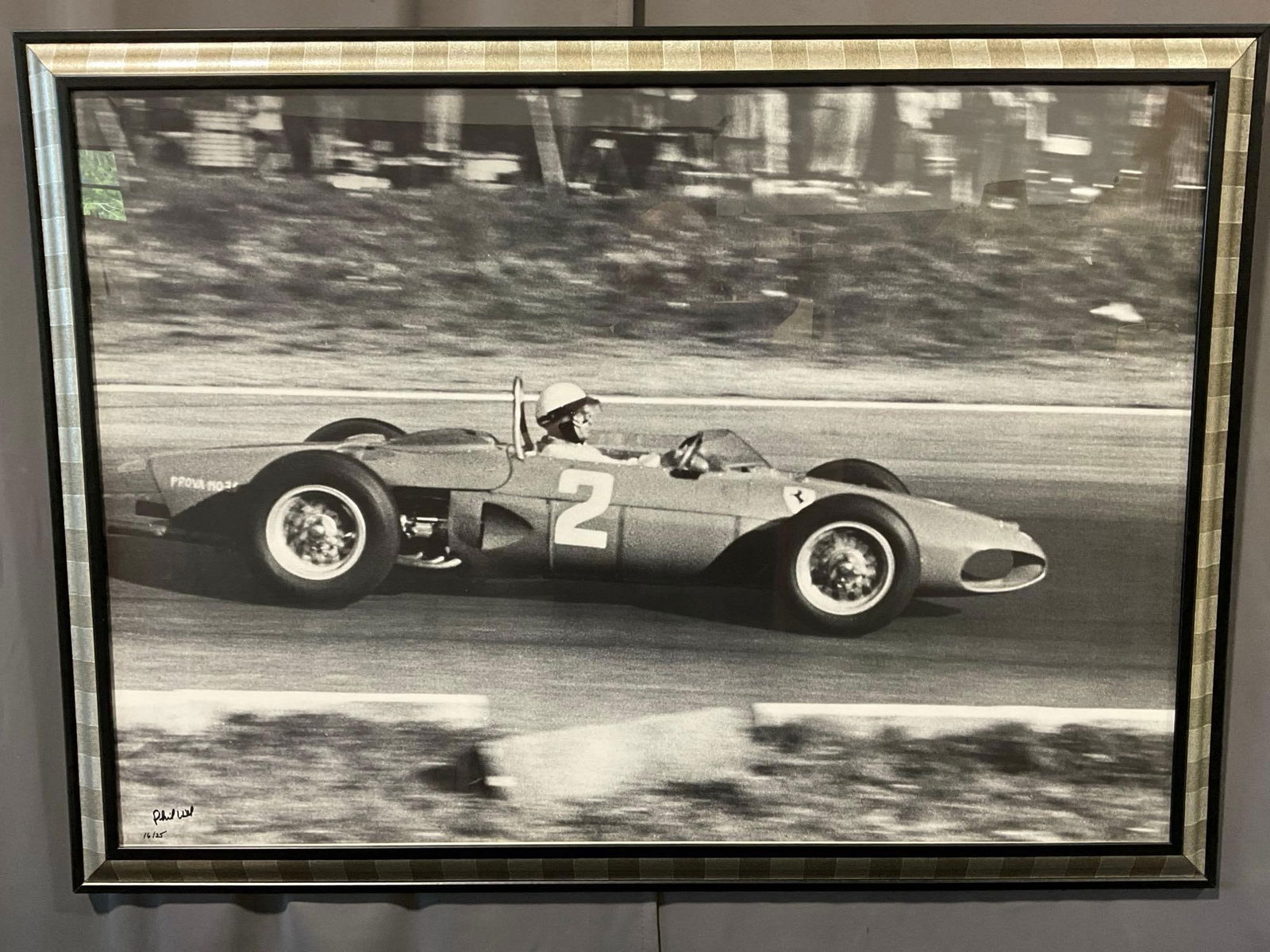Large Blown Up Photo of Signed Phil Hill Race Car Print, 31h x 43w x 3d inches, #d 16/25: Depicts a Ferrari 156 F1, driven by Phil Hill. Signed in the corner Phil Hill the driver of the vehicle in the photo, who won the 1961 Formula 1 World Drivers Championship. Appears to be in good