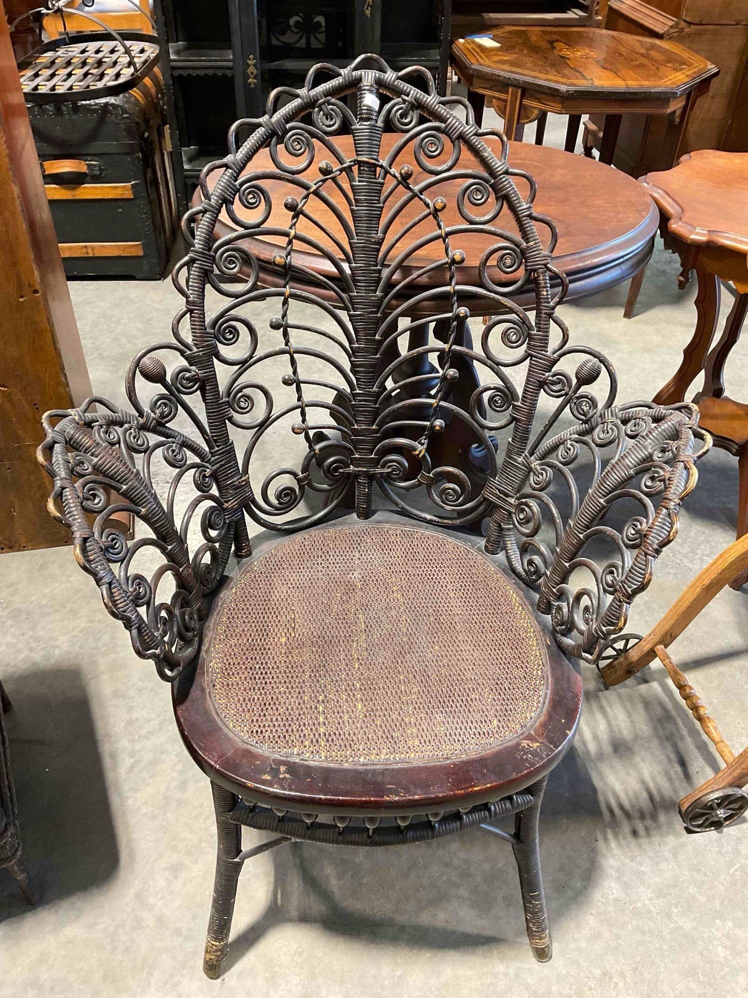 Antique Gorgeous Heywood Bros. Wicker Chair w/ Dark Stain & Ornate Shape. Very Good Cond.: Antique Gorgeous Heywood Bros. Wicker Chair w/ Dark Stain & Ornate Shape. Very Good Condition. Minor wear indicative of age, otherwise in very good condition. Measures 28" x 21" x 38"
