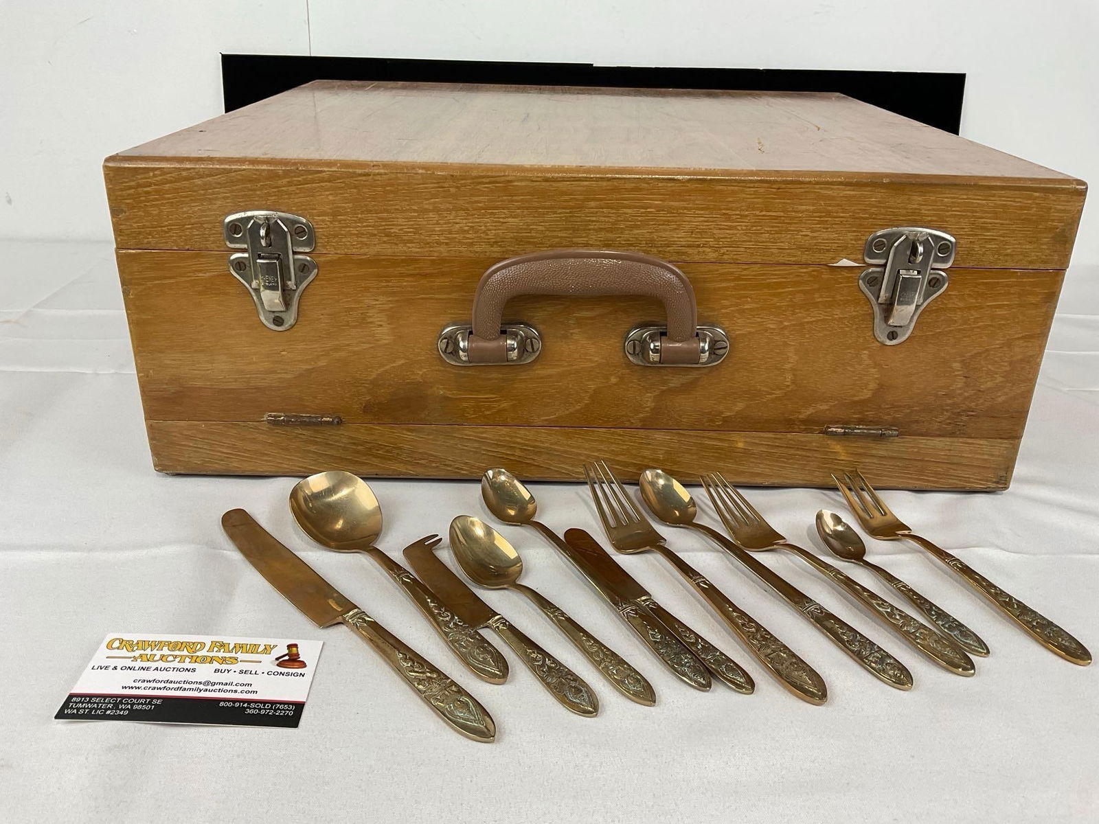 120+ Set Thai Brass Flatware pieces in wooden case, 8h x 20w x 19d inches, Three drawers: 9 serving pieces, 48 pieces in the top drawer, 48 in the next one, and approx 30 in the bottom drawer. Appears to be in good shape. The piece measures approx 8h x 20w x 19d inches. See pics. E-5540 
