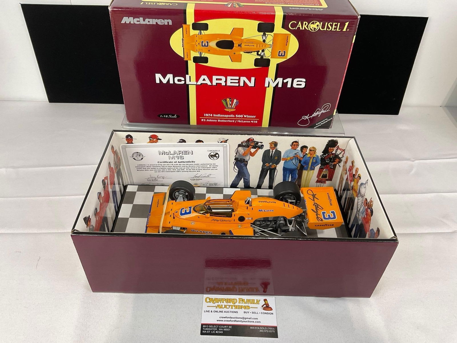 Carousel 1 McLaren M16 1974 Indy 500 signed by Johnny Rutherford, 1/18 Scale Diecast Car Model orig: The car model is signed as well as the box. Appears to be in good shape. The piece measures approx 6h x 15w x 9d inches. See pics. E-5420