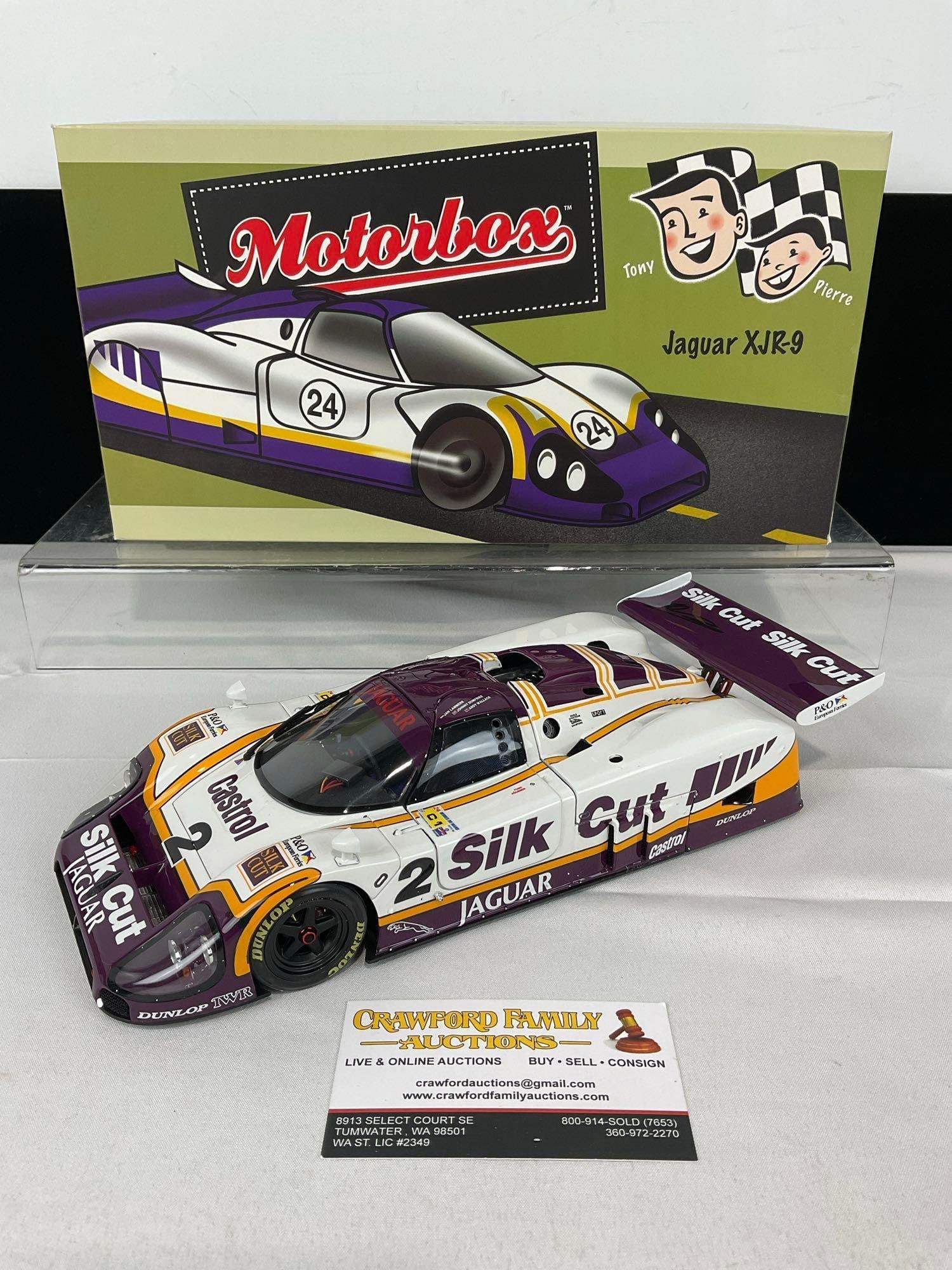 Motorbox 1988 Jaguar XJR9 LM 24H, Signed by Andy Wallace, 1/18 Scale Diecast Car Model orig box: The spoiler is signed. Appears to be in good shape. The piece measures approx 6h x 14w x 8d inches. See pics. E-5420 
