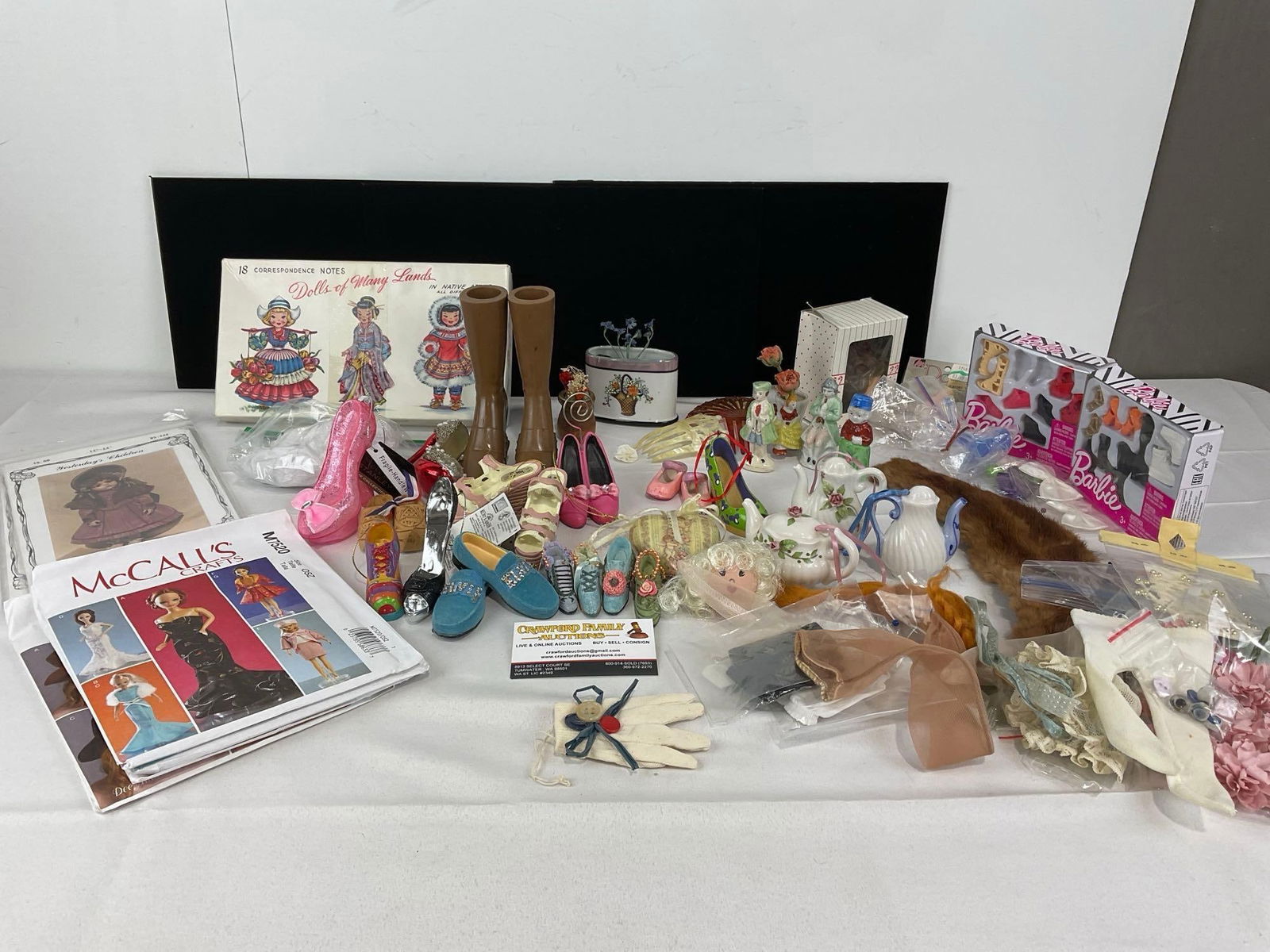 Asst of Doll related Collectibles, Shoe & Teapot Figures, Asst Clothes, Planters, Combs, Patterns (1 of 5)