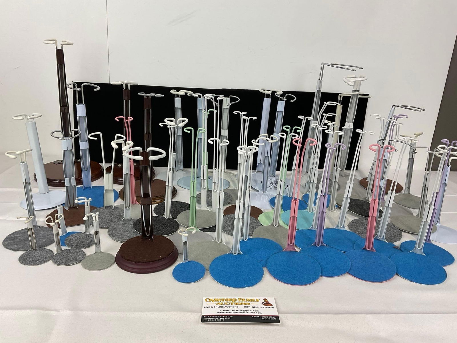 Assortment of 60 Doll Stands, Small & Large, Wire style, mostly good shape: Appears to be in good shape. The pieces fit in a box that measures approx 14h x 14w x 14d inches. See pics. E-5430 