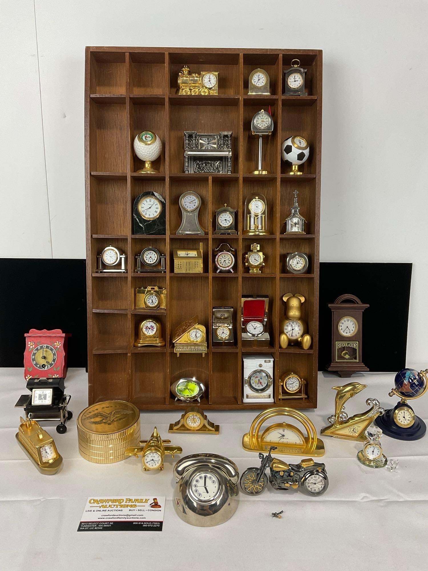 37 Mini Clock Pieces, Figural pieces, in Wooden Knick Knack Shelf, 22h x 14w x 3d inches: Appears to be in good shape. The piece measures approx 22h x 14w x 3d inches. See pics. E-5430 