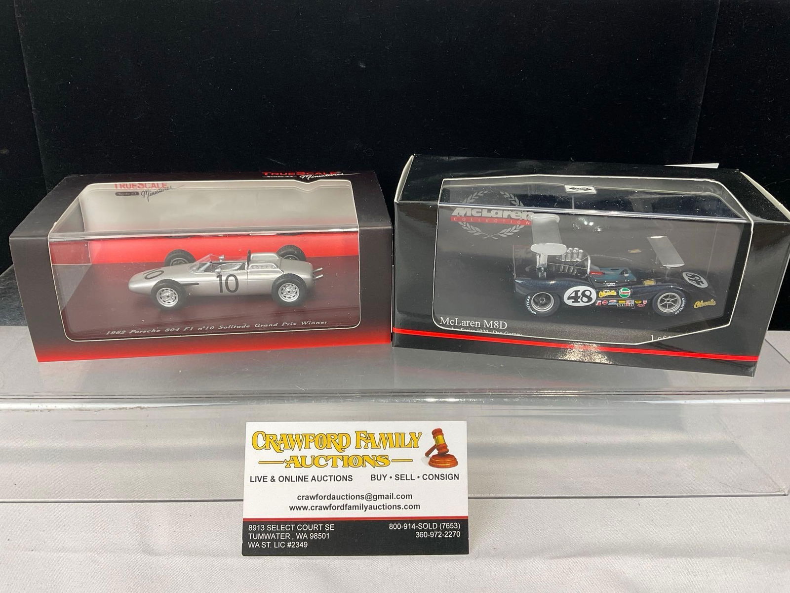 Pair of Dan Gurney 1/43 Scale Diecast Car Models, 1970 McLaren M8D Can Am & 1962 Porsche 804 F1 GP: Appears to be in good shape. The piece measures approx 6h x 7w x 4d inches. See pics. E-5420 