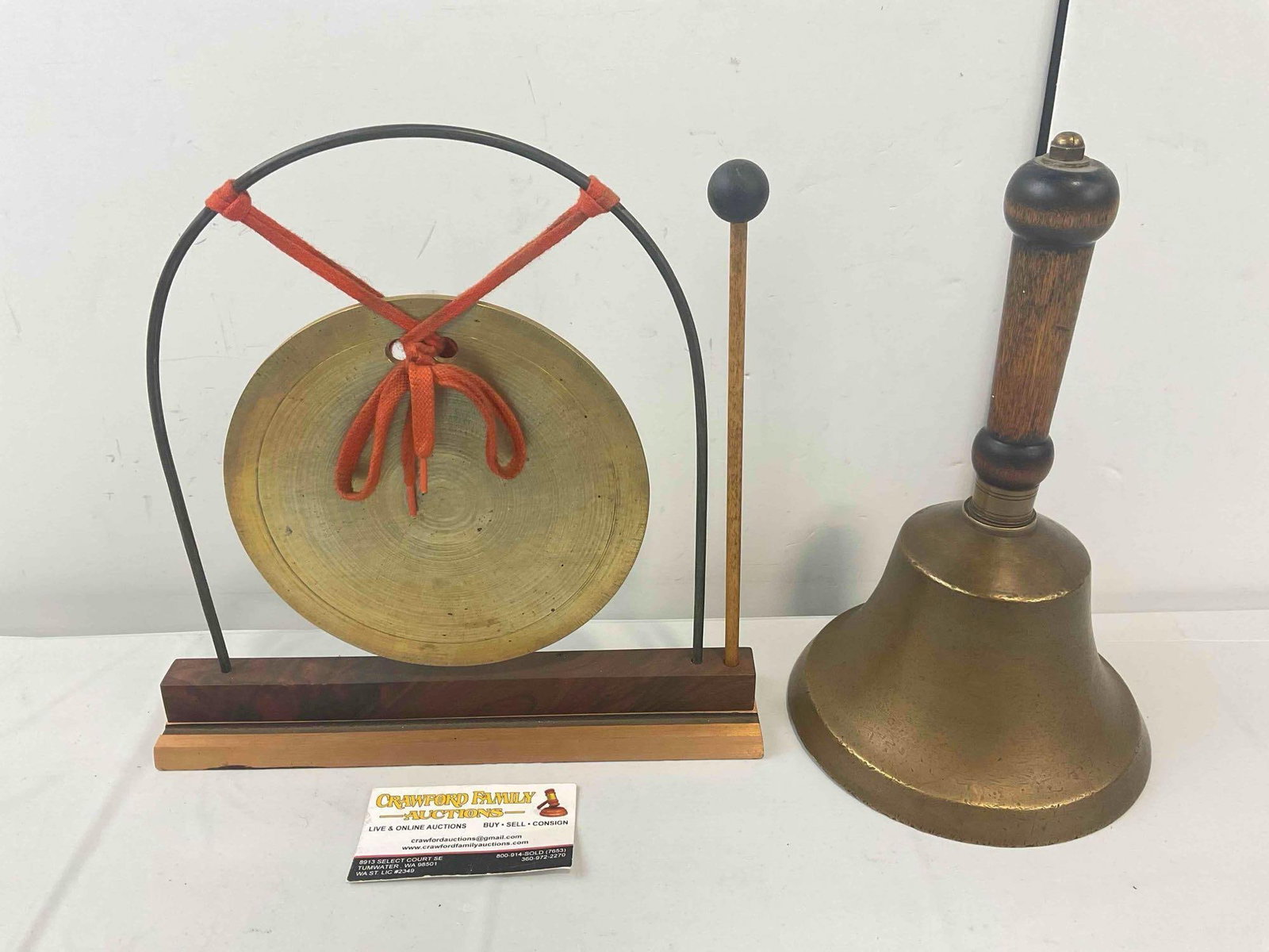 Brass Gong w/ Mallet & Brass Wood Handled Hand Bell. Excellent Condition. See pics.: Brass Gong w/ Mallet & Brass Wood Handled Hand Bell. Excellent Condition. Hand bell has clapper, works. Larger measures 11" x 3" x 11" DM-5360