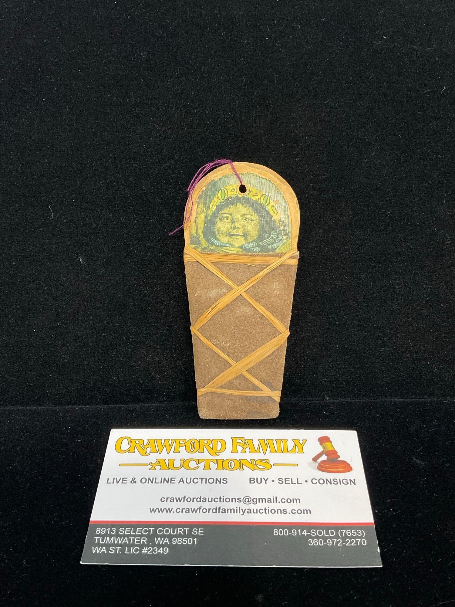 Early 20th Century Native American Papoose Paper doll, 5h x 3w x 3d inches: Appears to be in good shape. The piece measures approx 5h x 3w x 3d inches. See pics. E-5320 