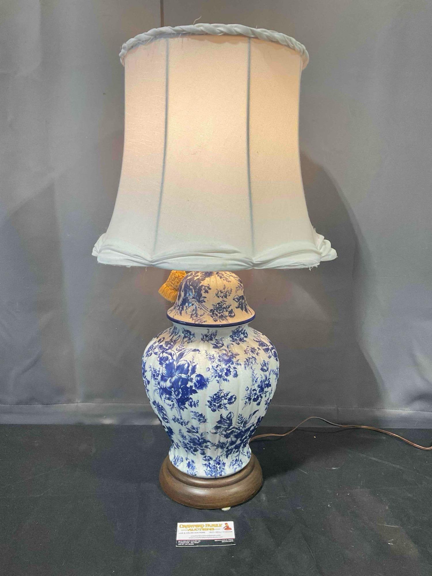 Vintage Blue & White Ceramic Urn Lamp w/ Cream Cloth Shade. Tested, Works. Excellent Cond.: Vintage Blue & White Ceramic Urn Lamp w/ Cream Cloth Shade. Tested, Works. Excellent Cond. minor wear to shade, one tiny chip, condition is otherwise excellent. Measures 14" x 14" x 28" DM-5520 