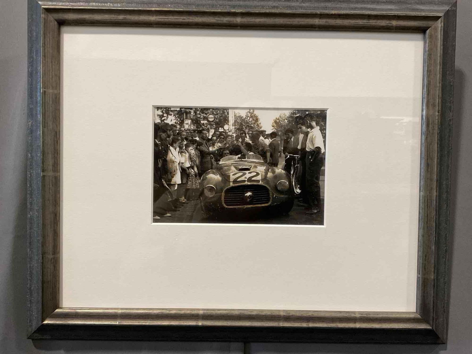 Framed Racing Photo Print, Chinetti/Selsdon Ferrari 166MM Le Mans 1949, 14h x 17w inches: Appears to be in fair shape, the piece has some wear or possibly artifacting from an older print, you can see some words backwards across it.. The piece measures approx 14h x 17w x 3d inches.