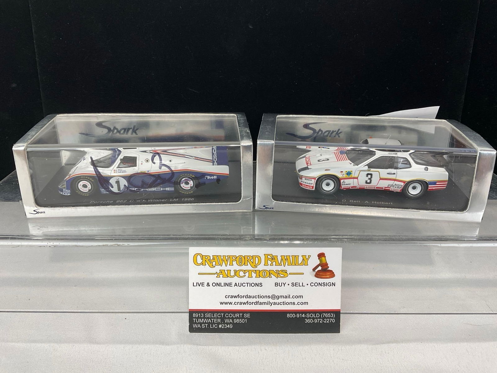 2 1/43 Scale Diecast Car Models, Porsche 924 LM 1980 & 962 1986, 1 Signed by Derek Bell: Appears to be in good shape. The piece measures approx 6h x 7w x 4d inches. See pics. E-5420 