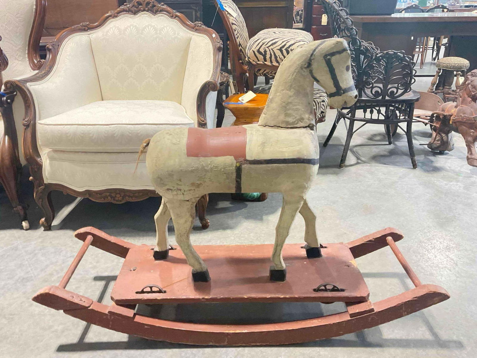 Antique White Painted Wooden Rocking Horse. Fair Condition. See pics.: Antique White Painted Wooden Rocking Horse. Fair Condition. Missing ears, tail and wooden handles, Neck is cracked at base, piece has wear indicative of age, condition is otherwise fair. Measures 44"