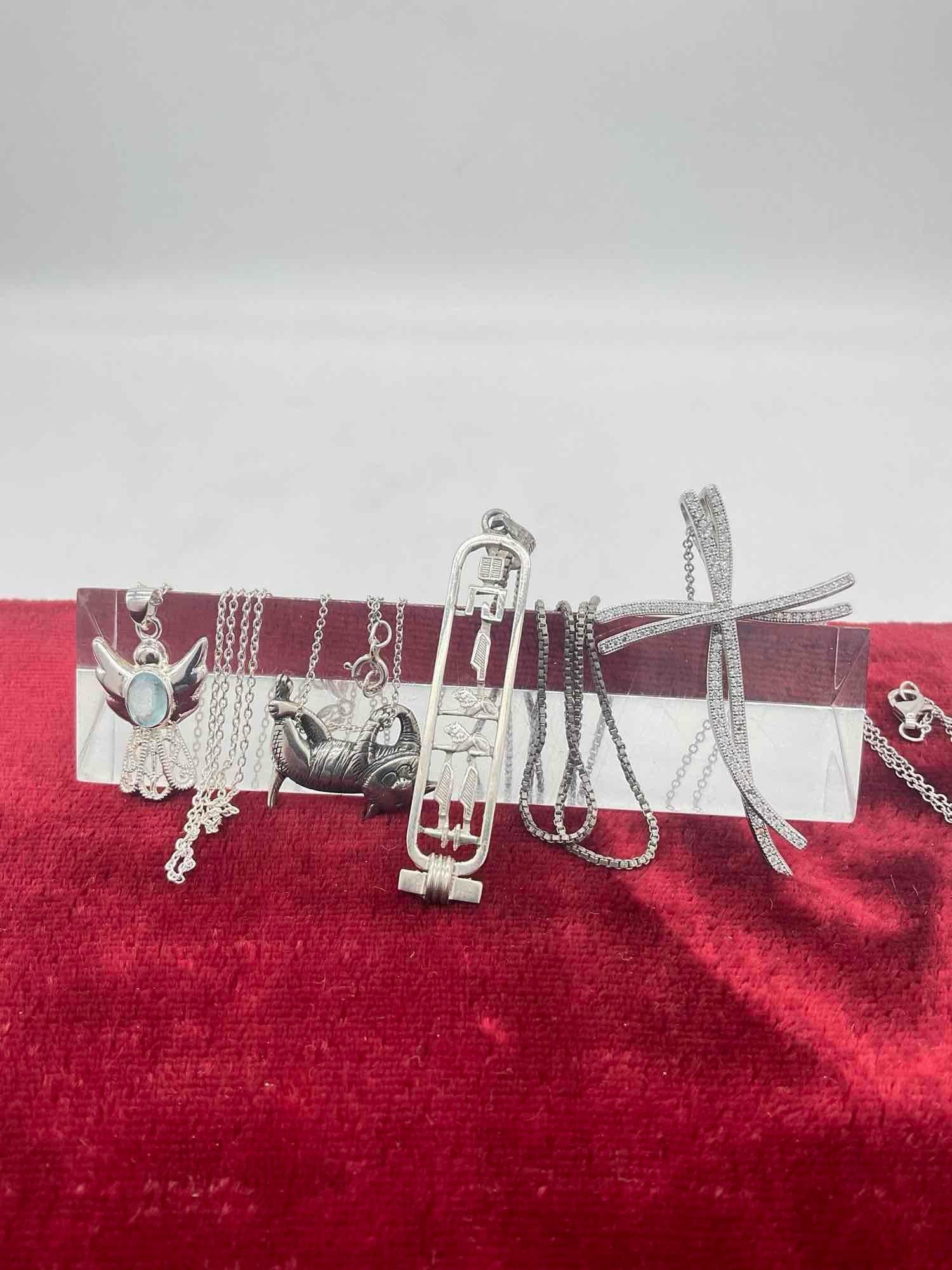 4x Sterling Silver necklaces w/ pendants, Egyptian, Bird, Cross & Edward GoreyDancing Cat: c-414 necklaces are 14" to 20" in length 20.84 grams TW