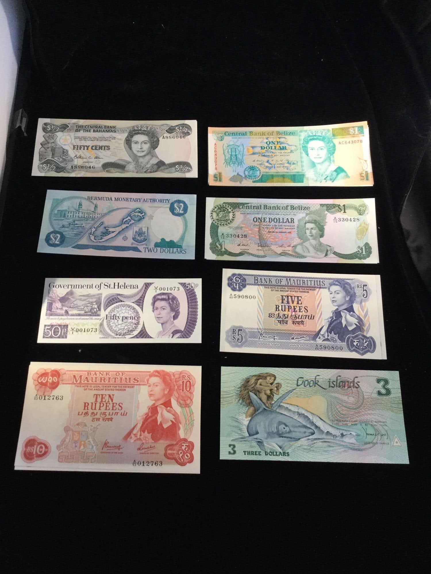 Set of 20 uncirculated bank notes from the Bahamas, Mauritius, and Cook Islands (1 of 10)