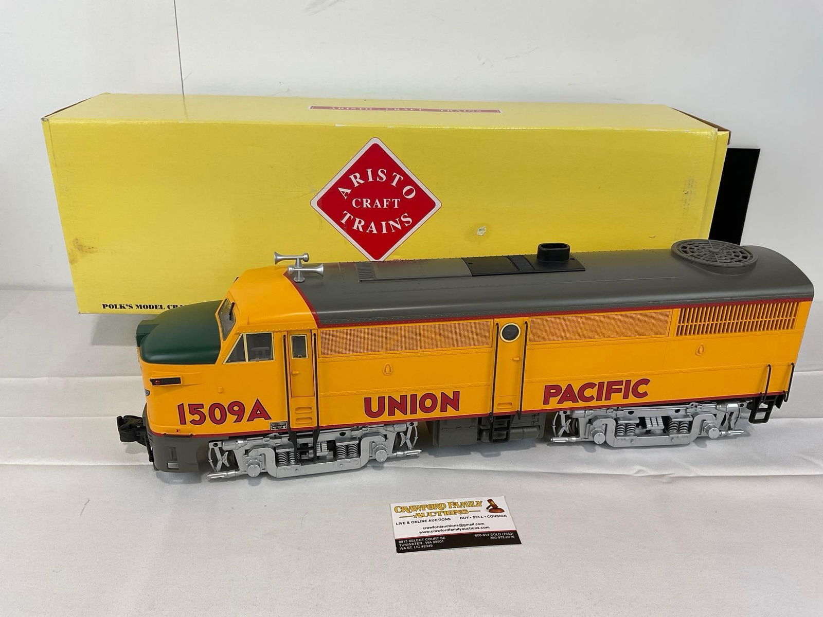 Aristo Craft Diesel Locomotive ALCO FA-1 ART-22005C UP/Union Pacific #1509A, 9h x 25w x 8d in: Same as the next lot. The box has some shelf wear, the consignor says the piece is brand new. Appears to be in good shape. The piece measures approx 9h x 25w x 8d inches. See pics. E-5560
