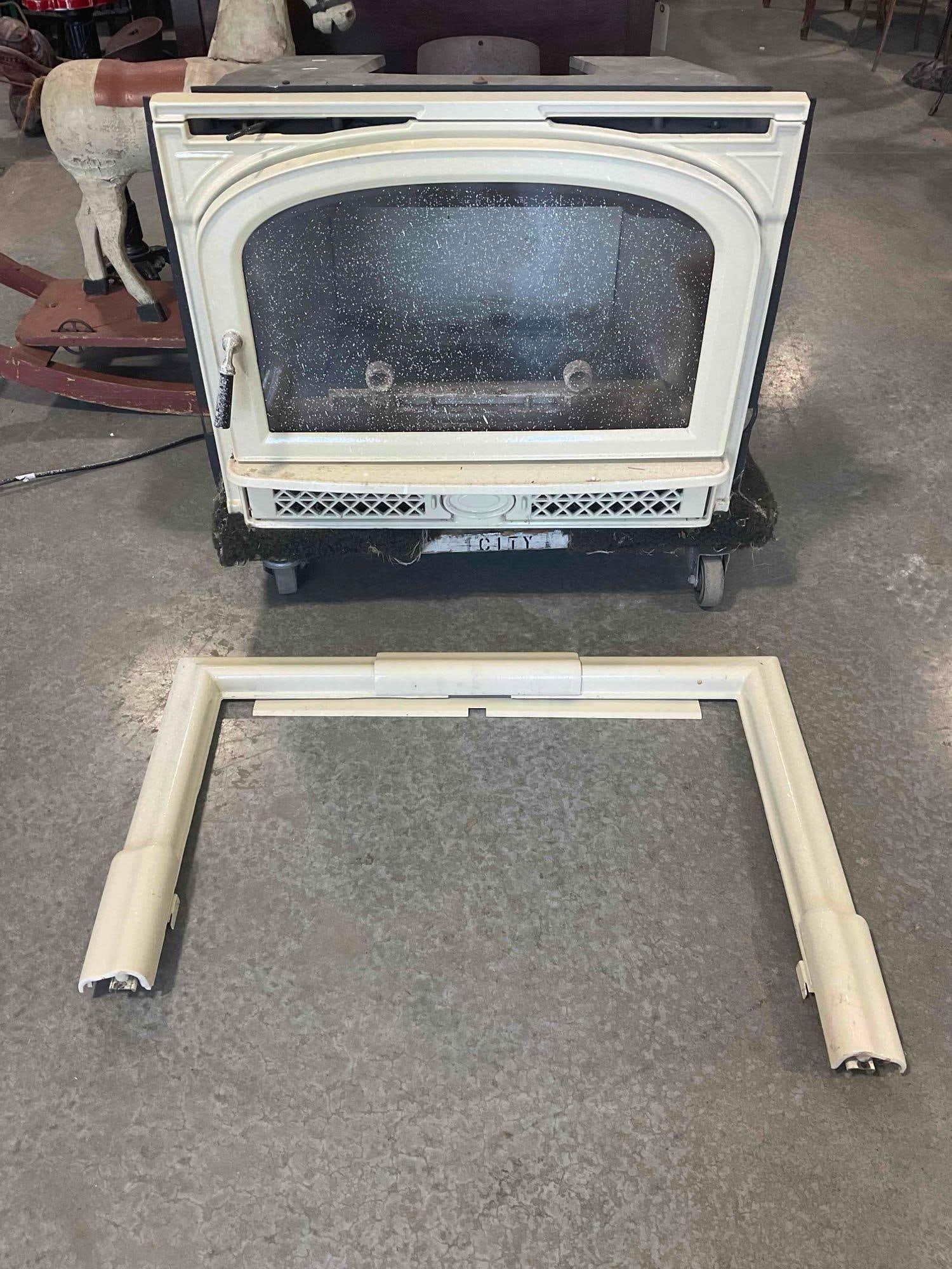 Vermont Castings Montpelier Fireplace Insert. Tested, No Response. As Is Condition. See pics.: Vermont Castings Montpelier Solid Fuel Fired Fireplace Insert. Tested, No Response. As Is Condition. Needs a fuel source, likely needs a servicing. Includes a metal insert for wall. Measures 31" x