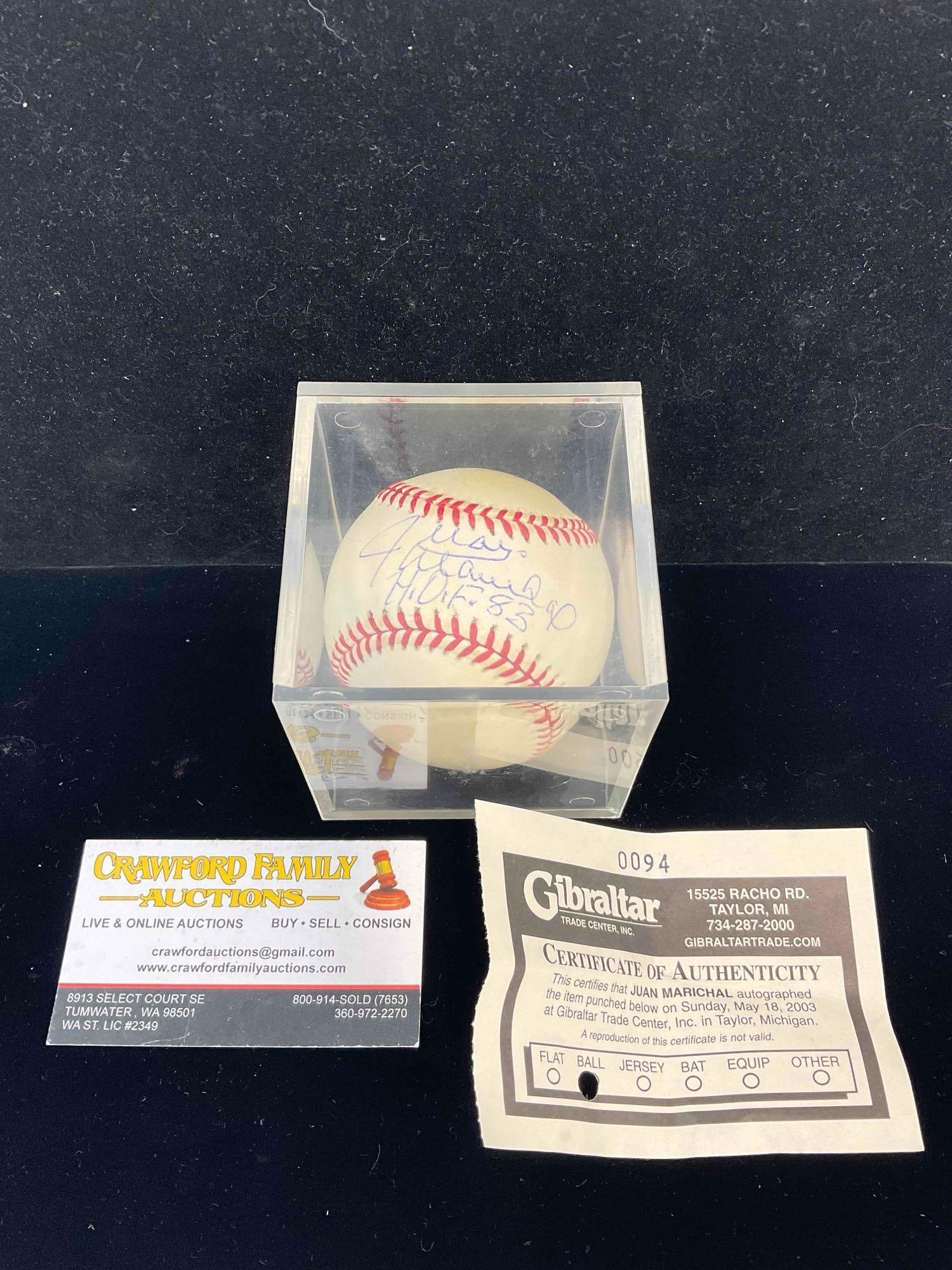 Baseball Signed by Player Juan Marichal in Acrylic Case w/ COA. Very Good Condition.: Baseball Signed by Player Juan Marichal in Acrylic Case w/ COA. Very Good Condition. Minor wear to case, condition is otherwise very good. Measures 4" x 4" x 4" DM-5570 