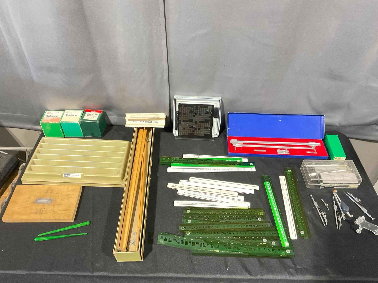 25+ pcs Vintage Lettering & Drafting Supplies, incl. Keuffel & Esser Co. Pantograph. See pics.: 25+ pcs Vintage Lettering & Drafting Supplies, incl. Keuffel & Esser Co. Pantograph. Also includes stencils, lettering kits, stabilenes, compasses and more! Largest measures 22" x 3" x 3"