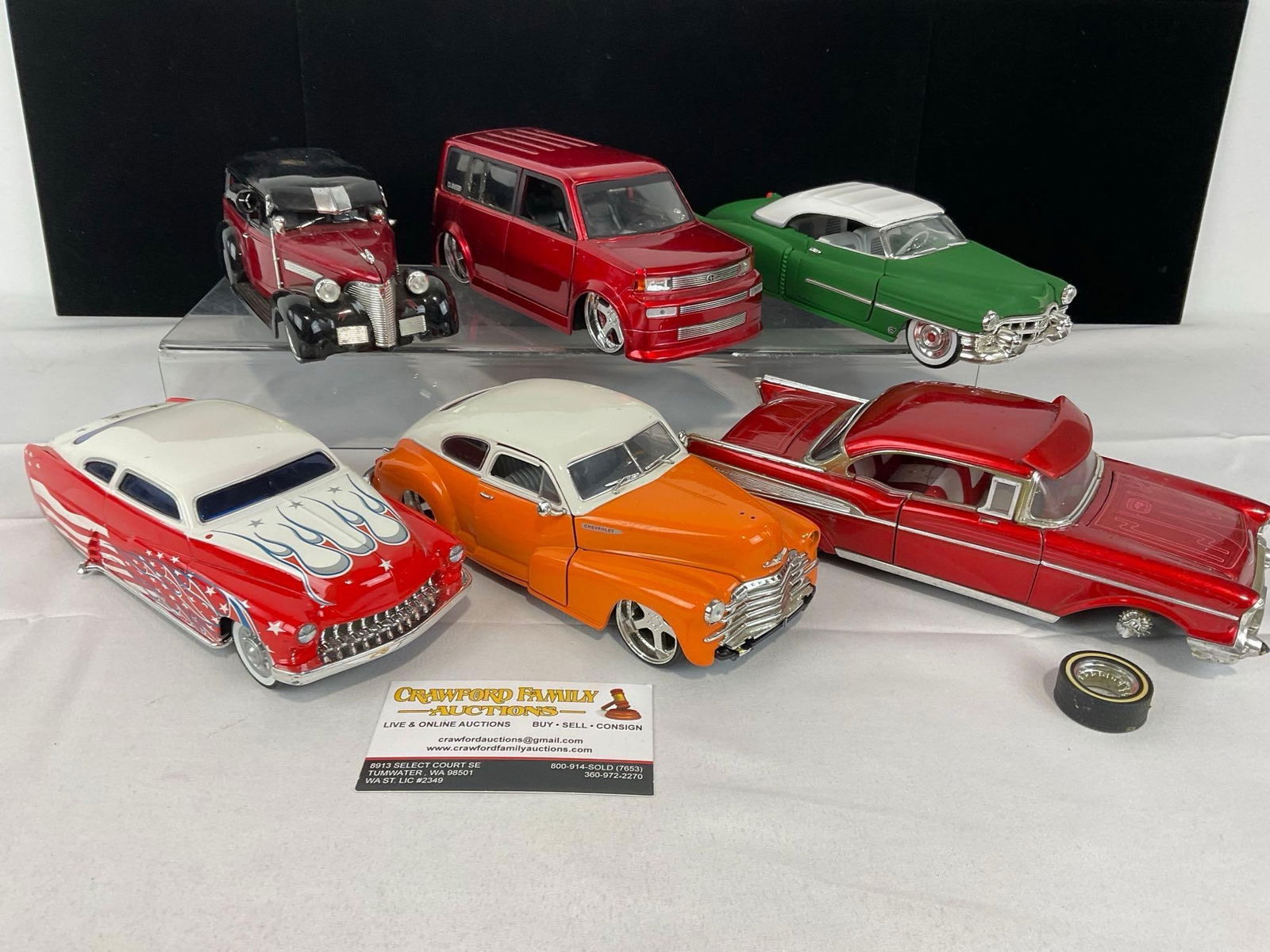 6 1/24 Scale Diecast Cars, 1947 Chevy Fleetline, 57 Bel Air, 53 Caddy, 1949 Mercury, & Scion xB: Appears to be in good shape. The piece measures approx 10h x 13w x 8d inches. See pics. E-5560 