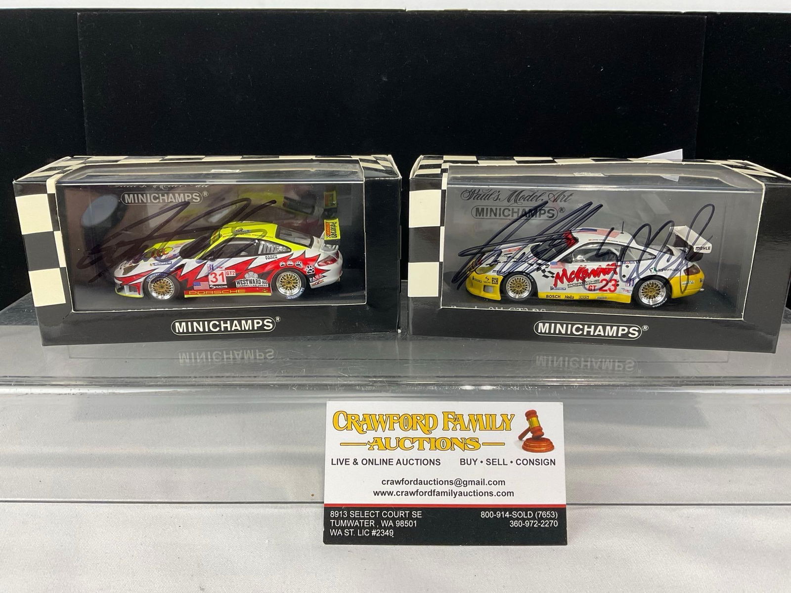 2 MInichamps 1/43 Scale Diecast Car Models, 2002-05 Porsche 911 GT3 RSR Both Signed by 2 Drivers: Signed by Jerg Bergmeister & Patrick Long, Lucas Luhr & Sascha Maassen. All comes from the same collection. Appears to be in good shape. The piece measures approx 7h x 7w x 4d inches. See pics