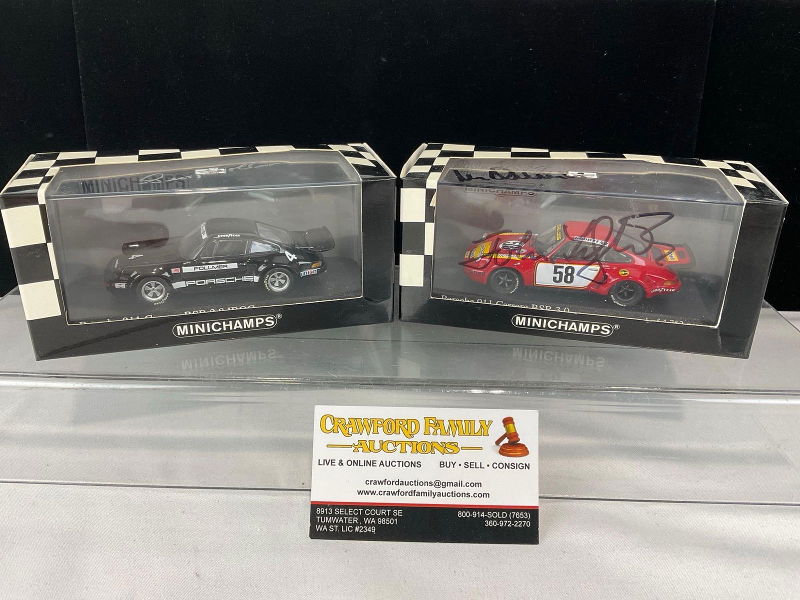 2 Minichamps 1/43 Scale Diecast Car Models, 1973-75 Porsche 911 RSR, signed by 1 & 3 Drivers: 1 Signed by George Folmer & the other is signed by John Fitzgerald, Gijs van Lennep & Manfred Schniti. All comes from the same collection. Appears to be in good shape. The piece measures