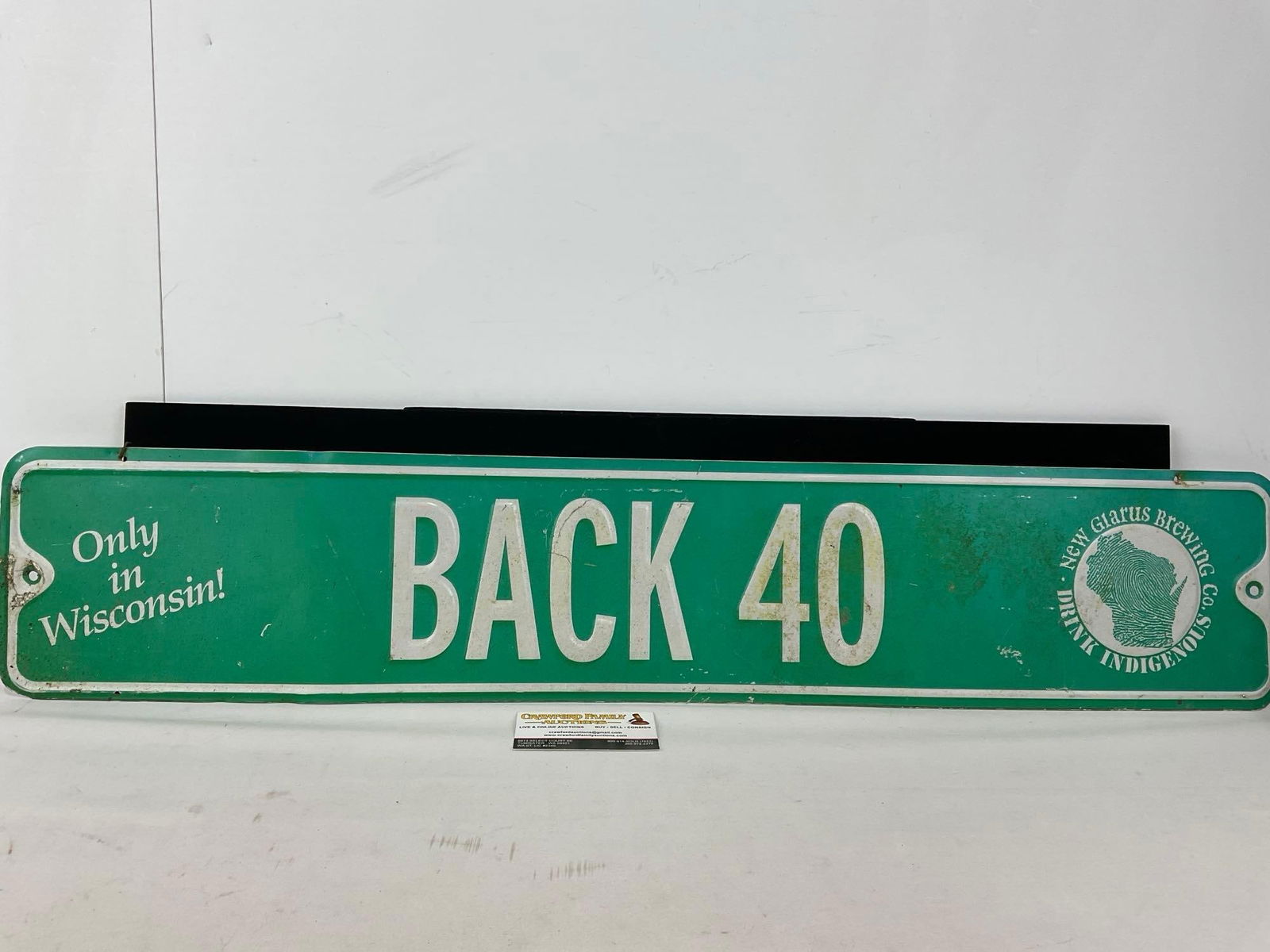 New Glarus Brewing Co. Back 40 Street Sign style piece, Wisconsin Beer company, 8x 35 inches: Appears to be in fair to good shape. The piece measures approx 8h x 35w x 3d inches. See pics. E-5440 